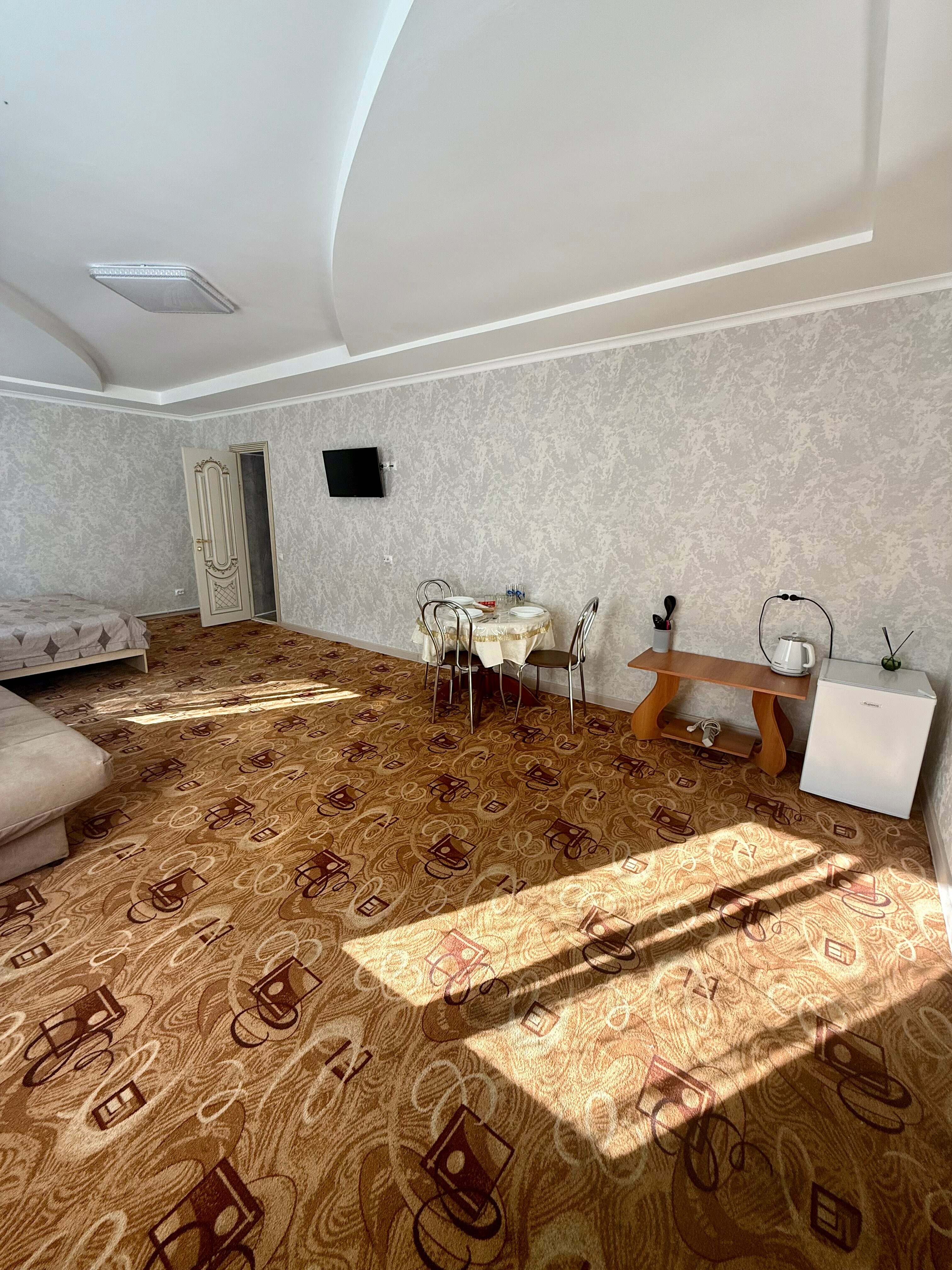 Улучшенный четырехместный номер