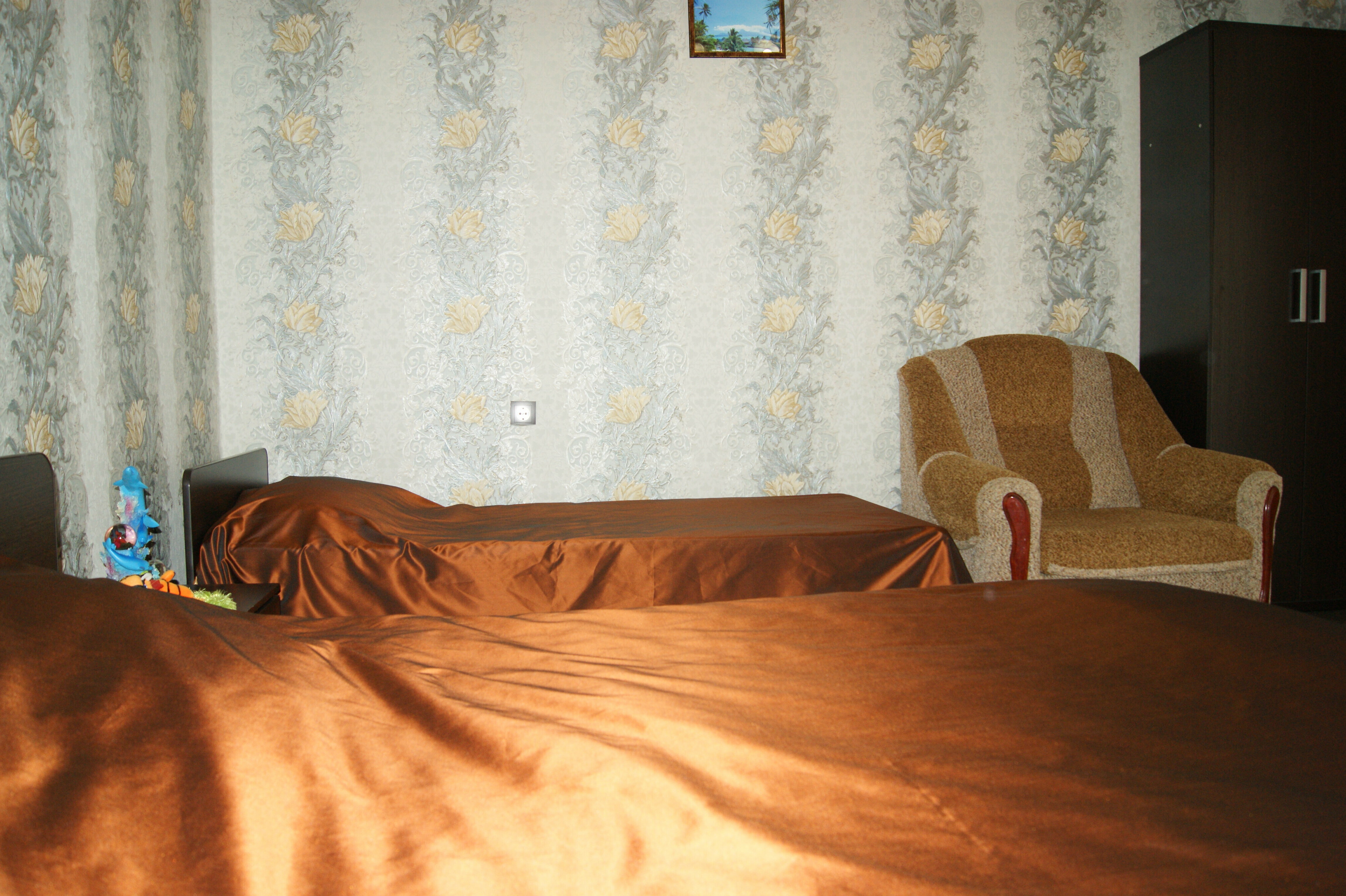 Четырехместный номер с видом на сад