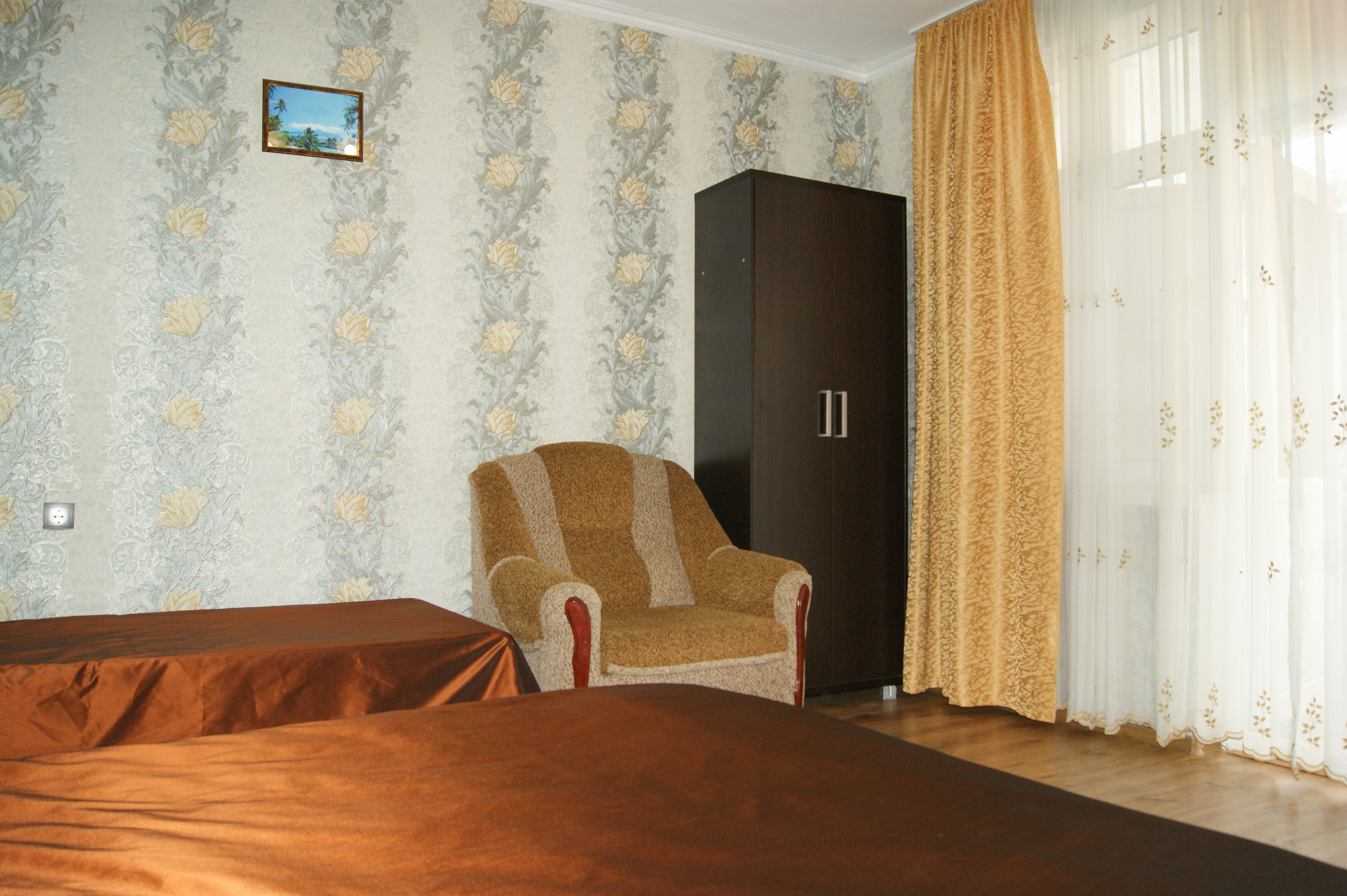 Четырехместный номер с видом на сад