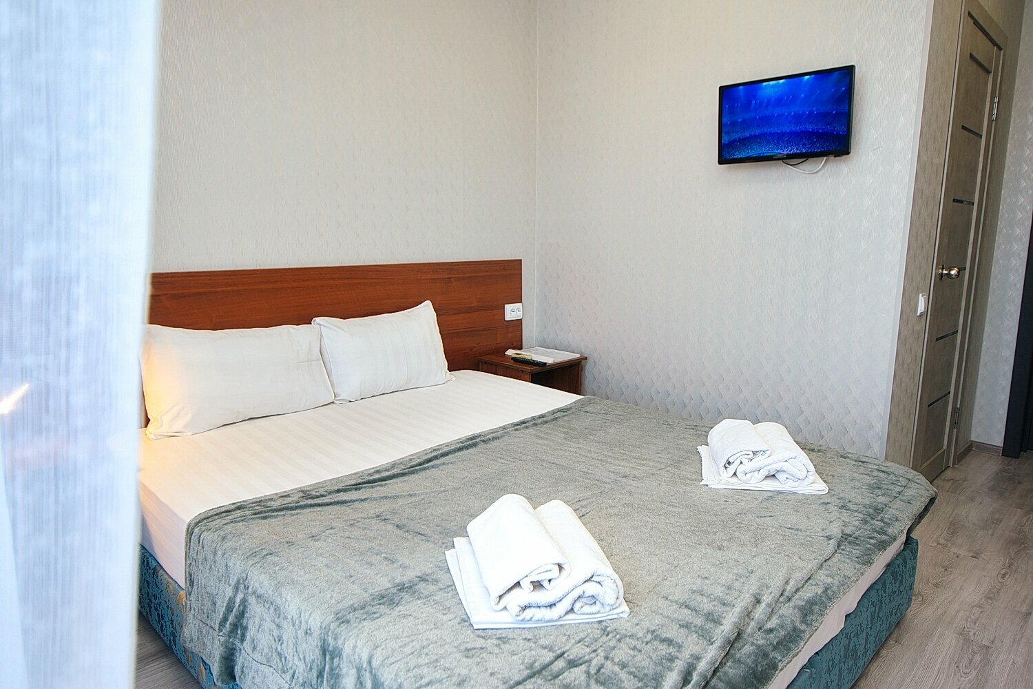 Трехместный номер с балконом