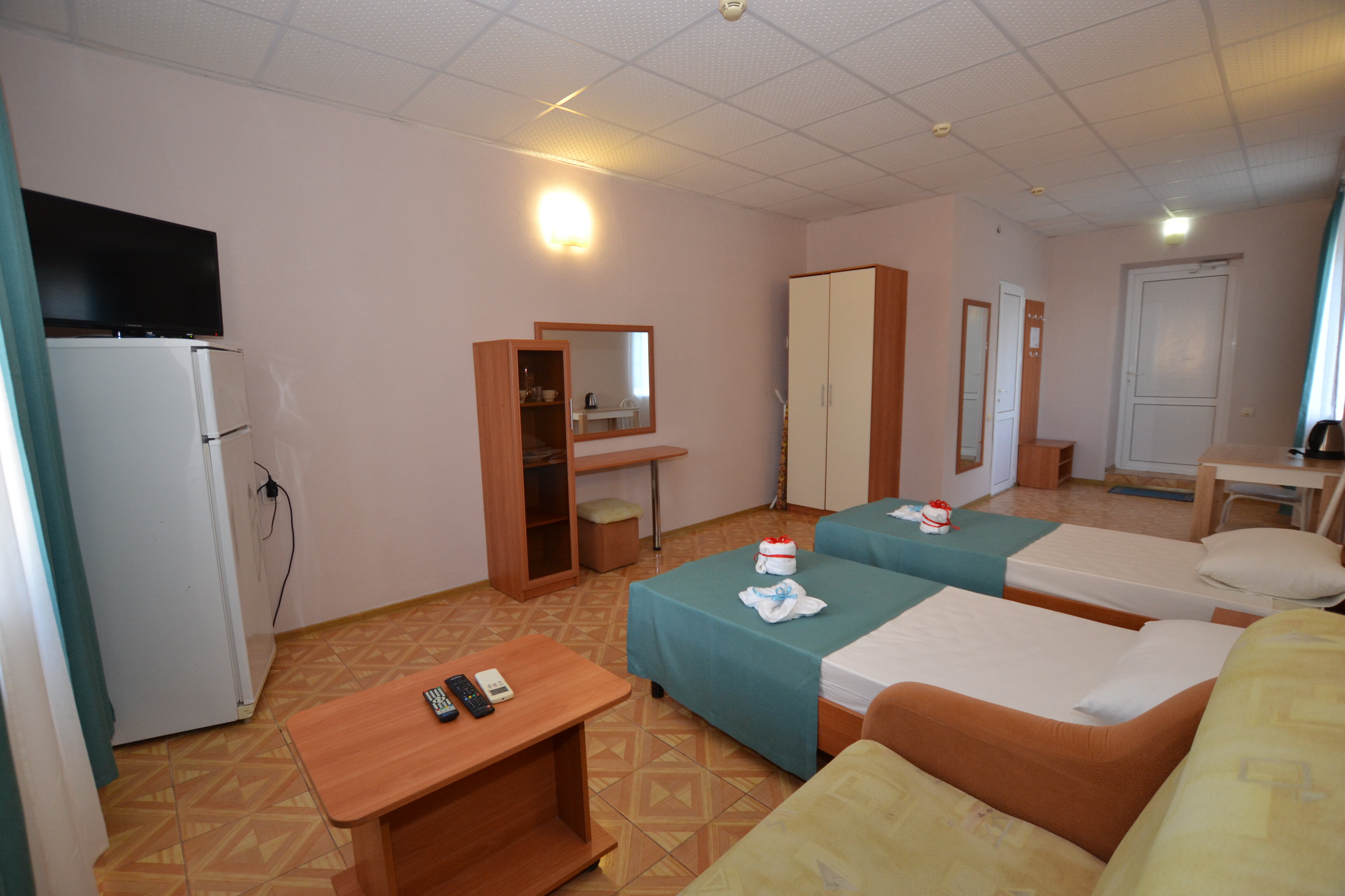 Трехместный номер с балконом