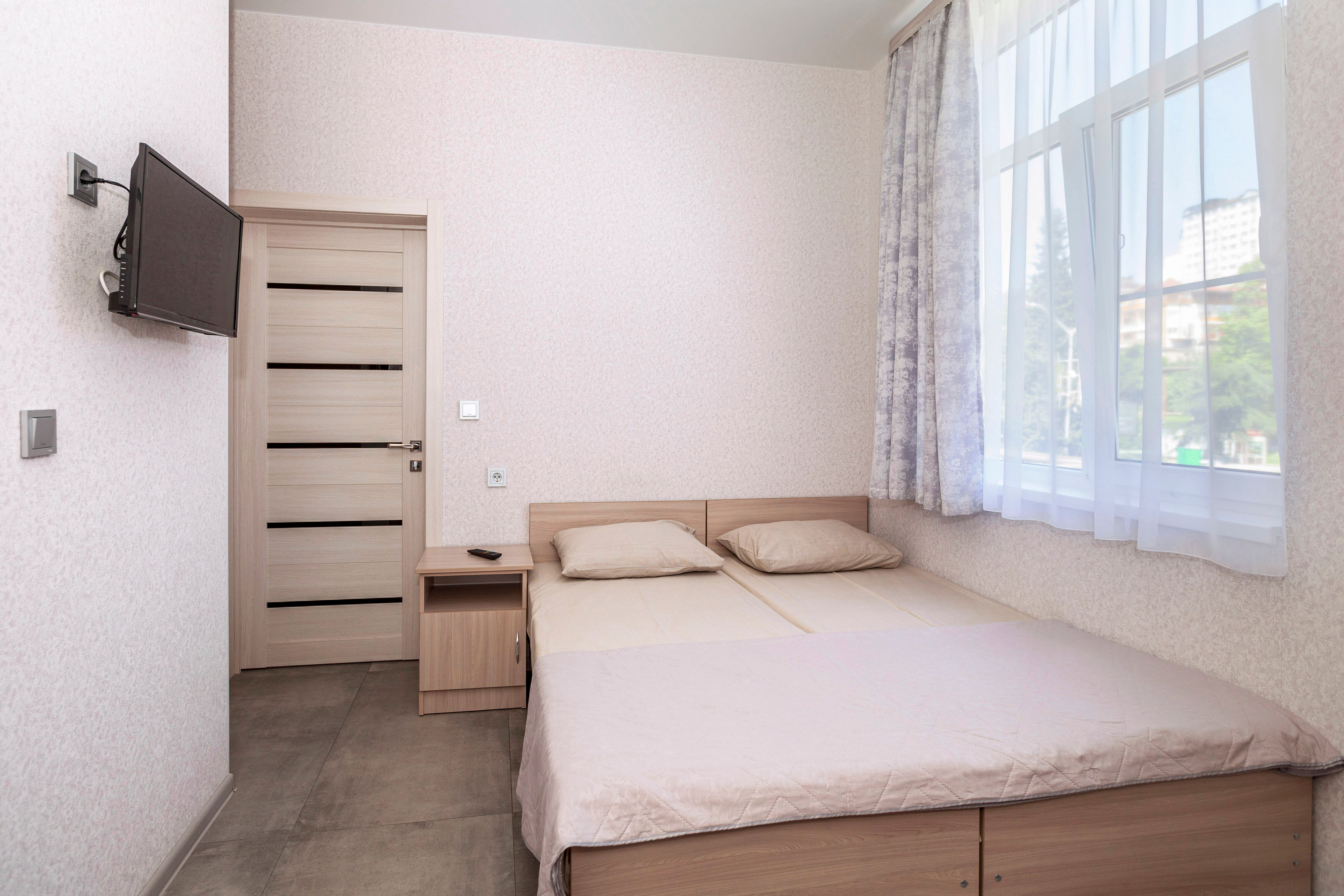 Двухместный с 1 кроватью или 2 отдельными кроватями и душем