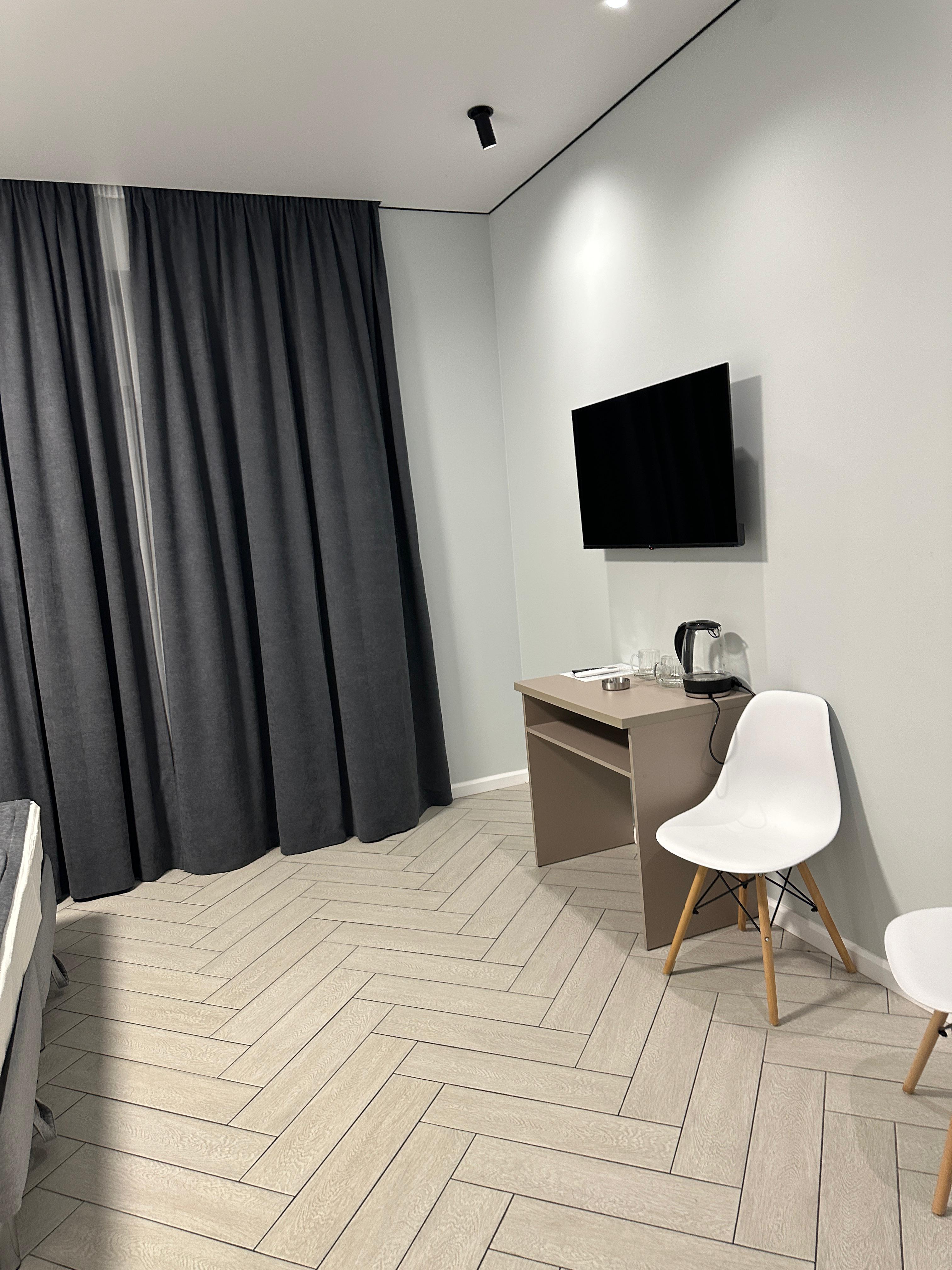 Трехместный номер с балконом