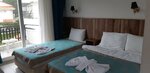 Standard Family Room в Elijah Hotel