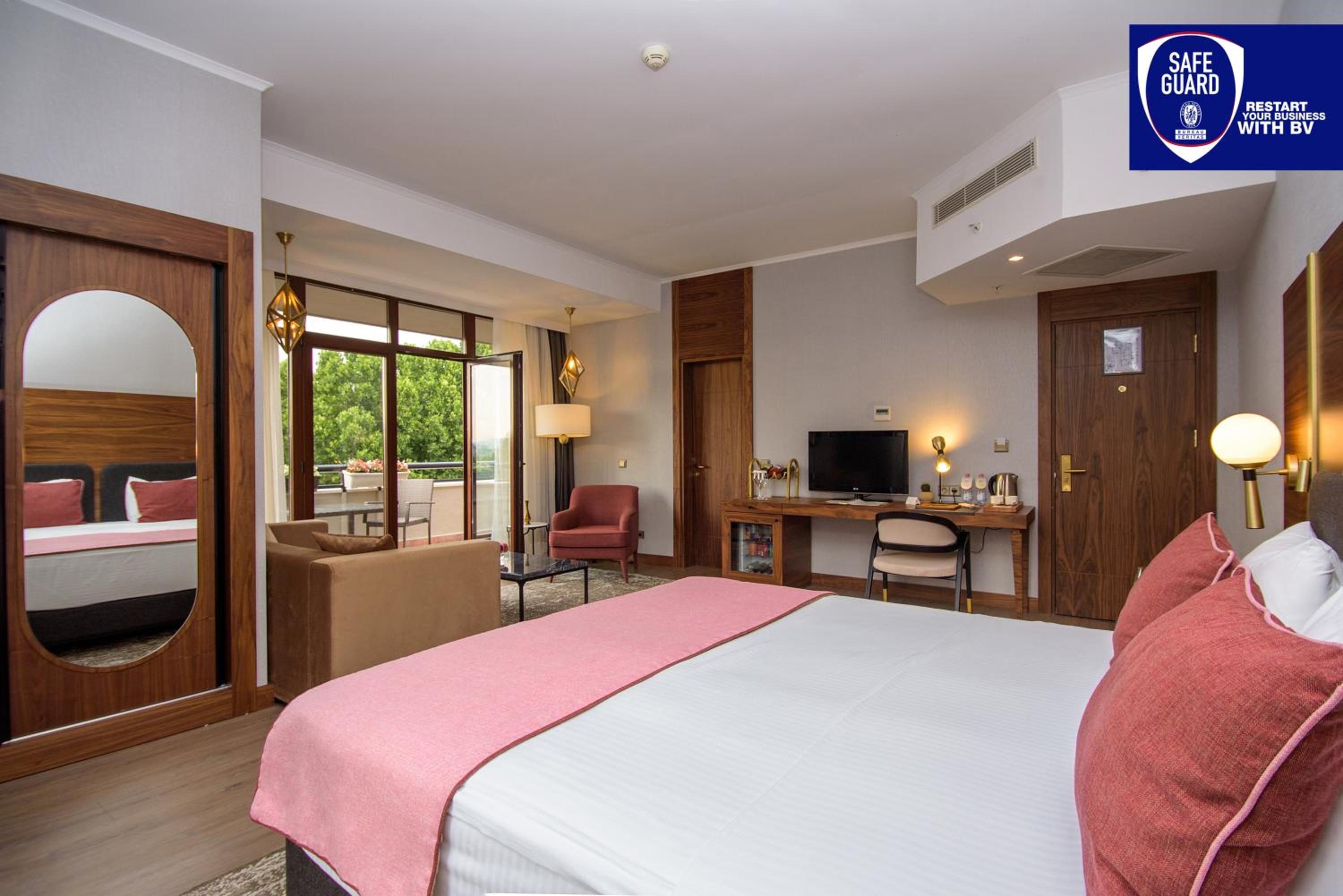 Superior Double Room with Balcony and City View