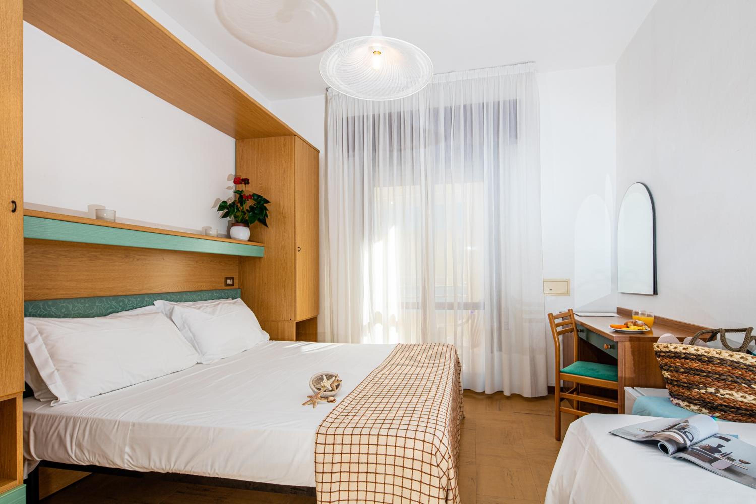 Standard Triple Room With Side Sea View