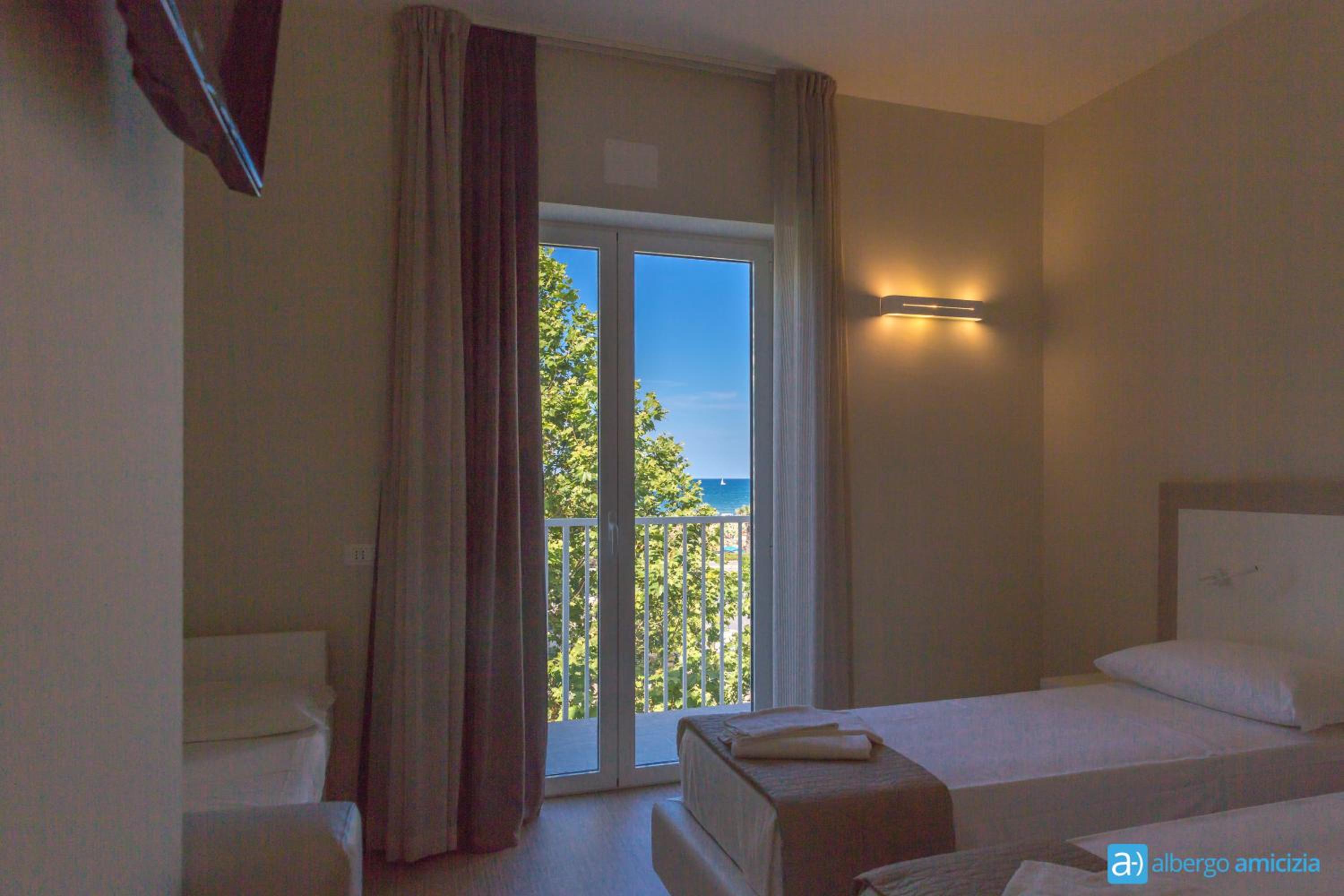 Family Room with Balcony (2 Adults + 2 Children)