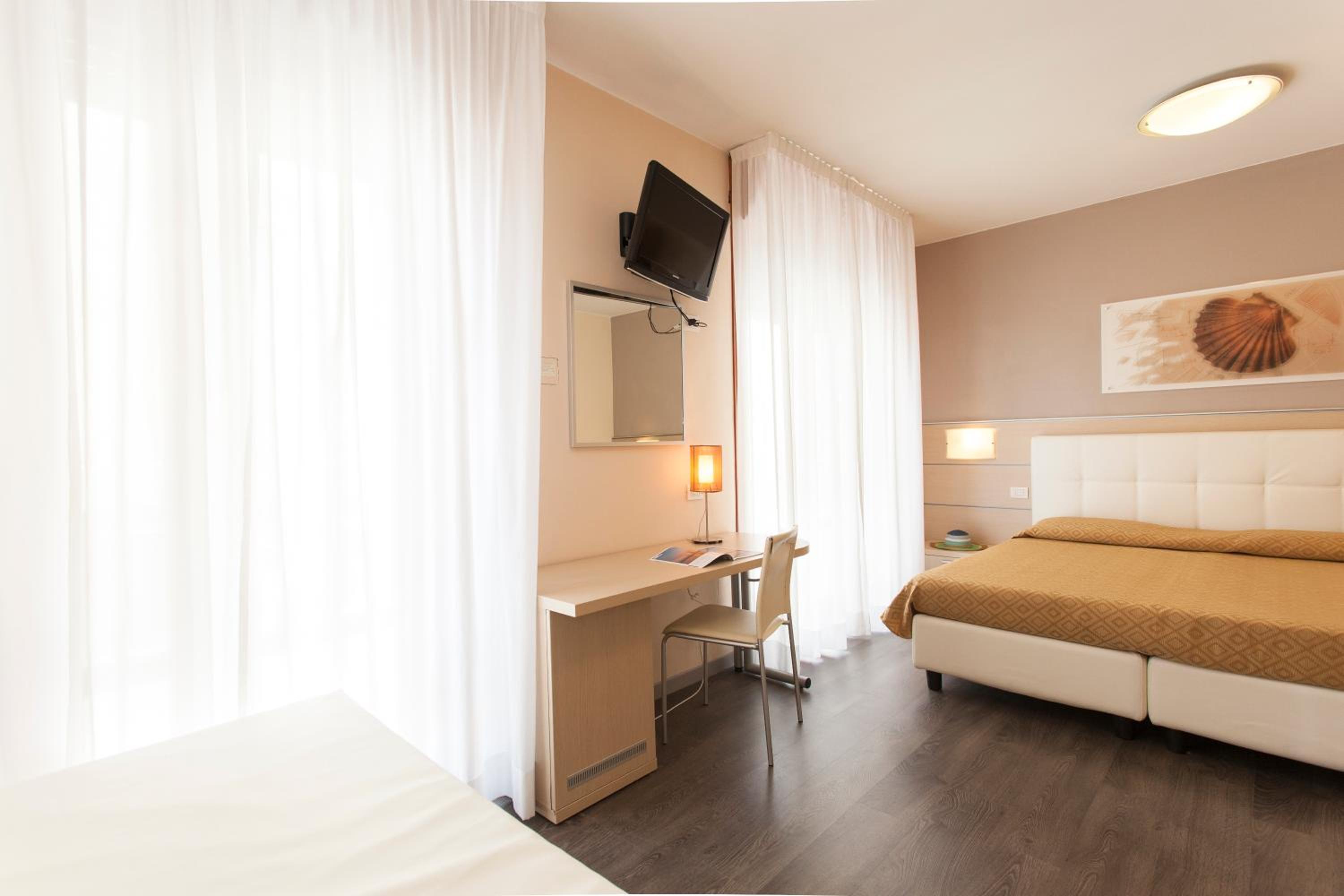 Family Quadruple Room with Side Sea View