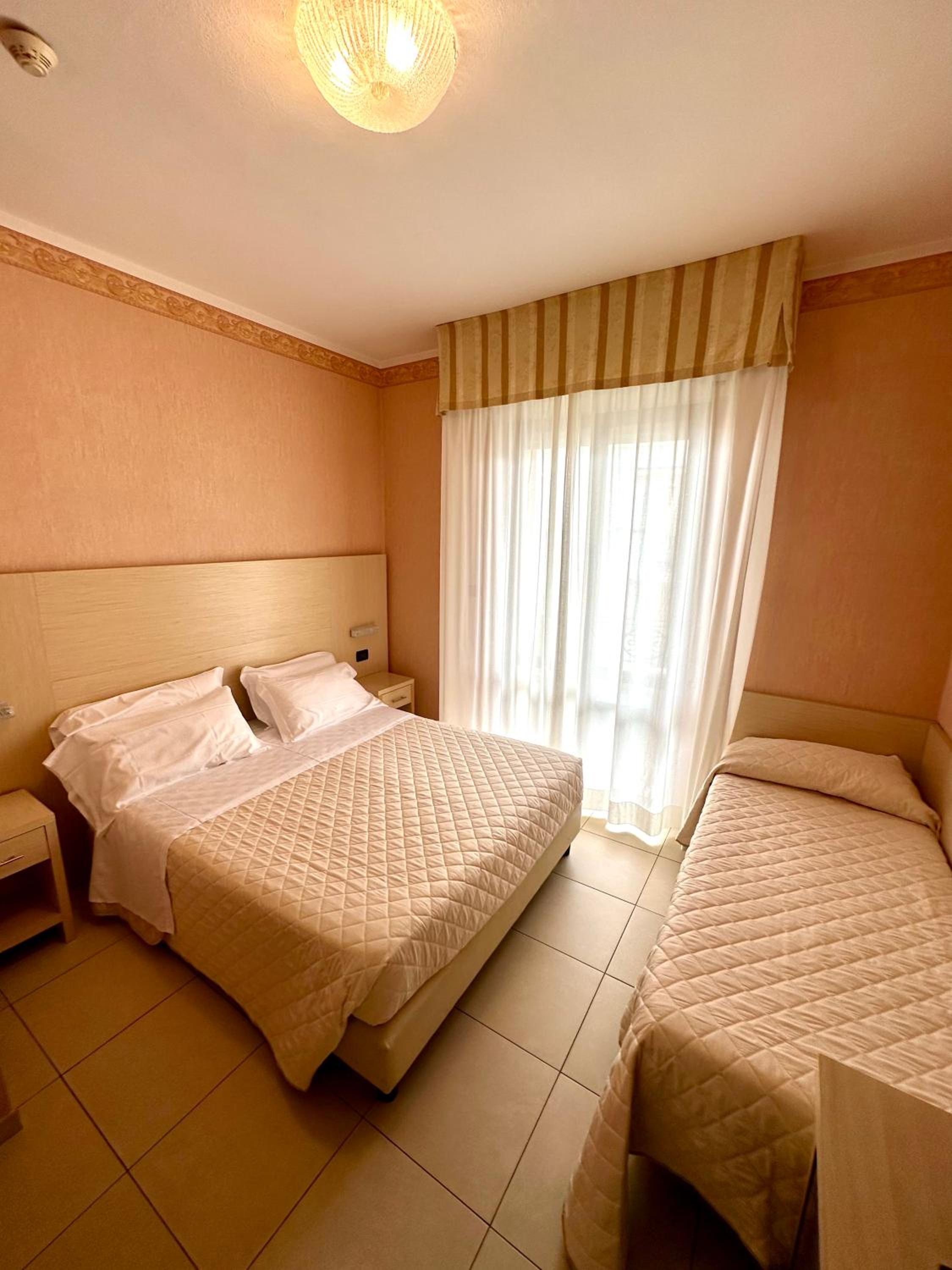 Standard Triple Room with side Sea View