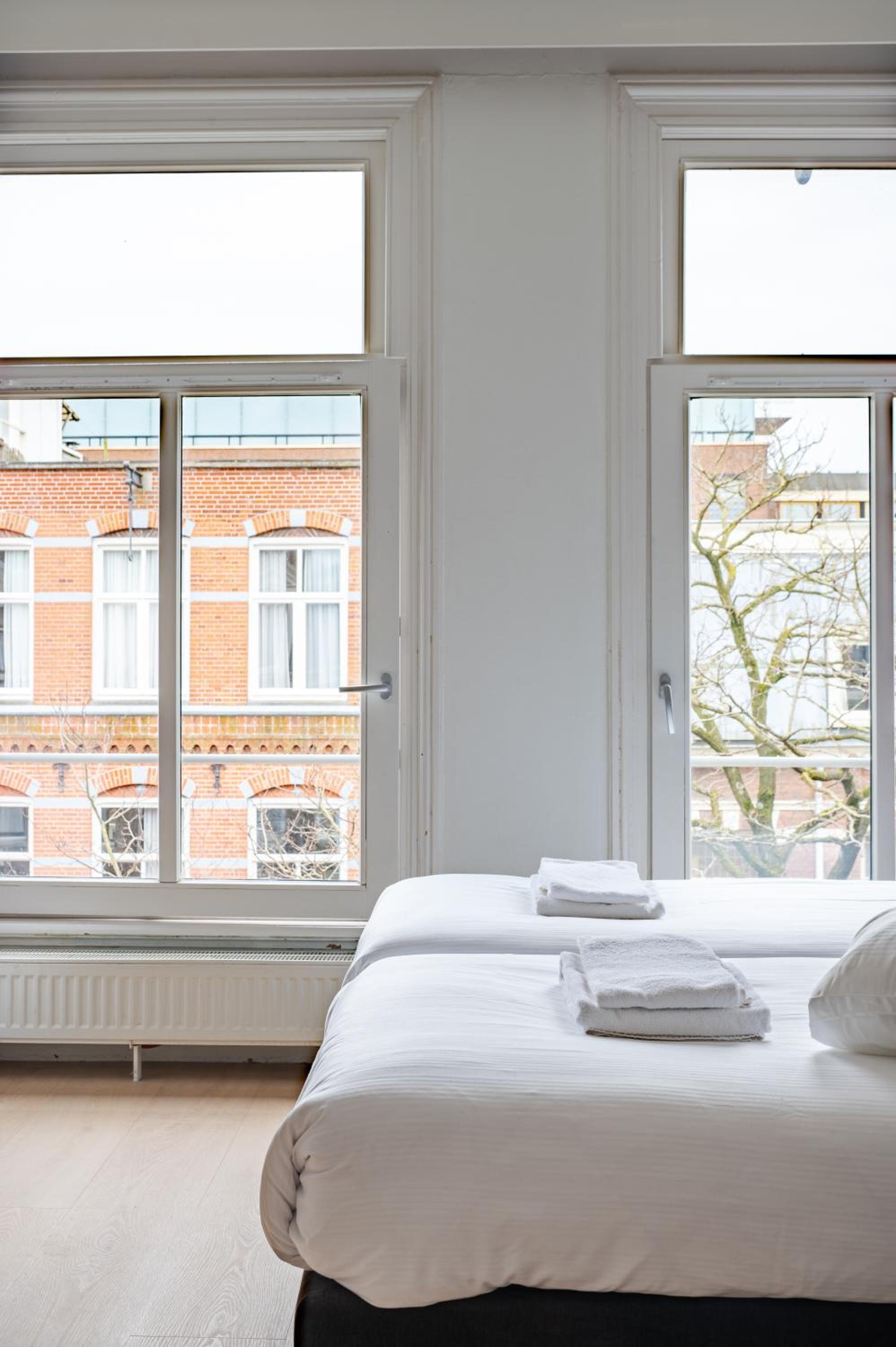 Standard Quadruple Room with Private Bathroom 