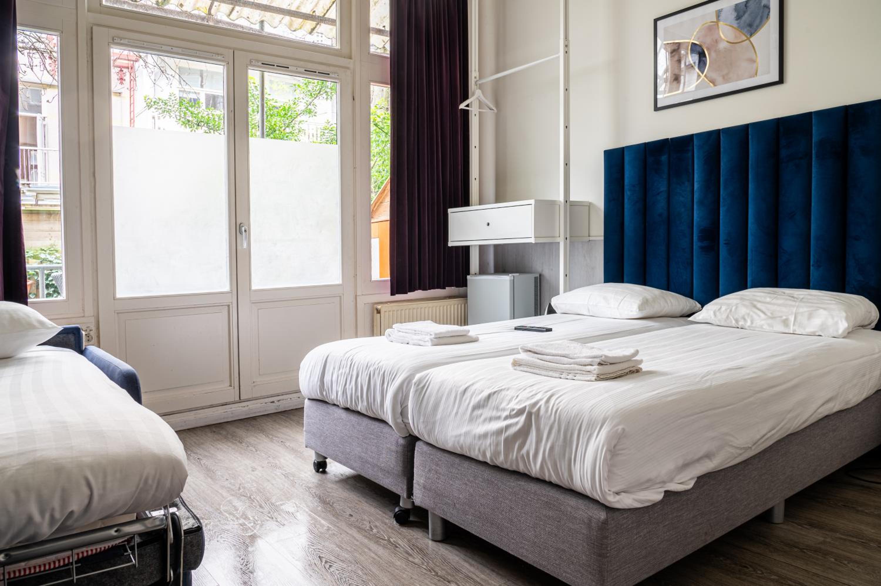 Standard Triple Room with Private Bathroom