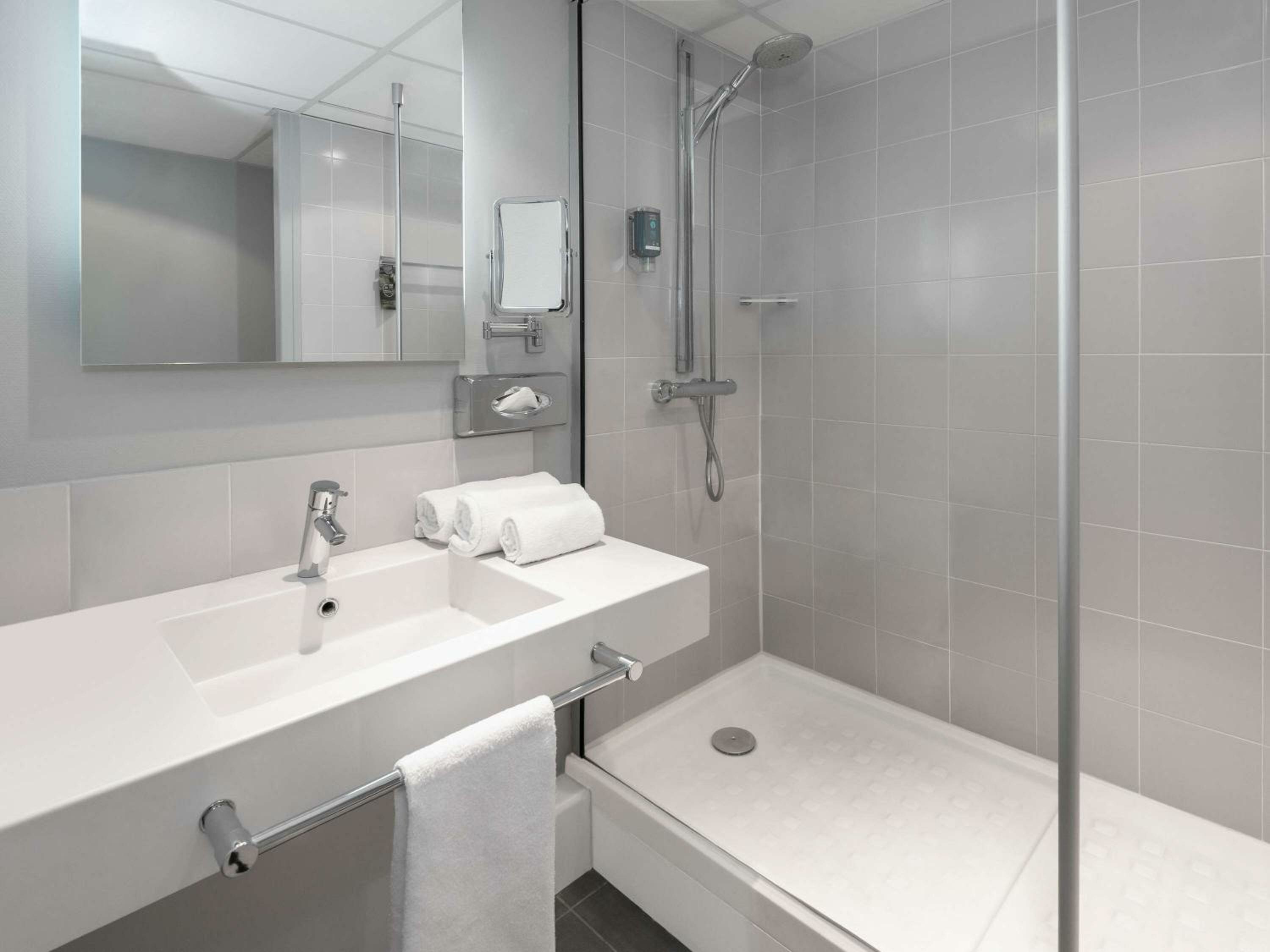 Standard room with double bed and  sofa