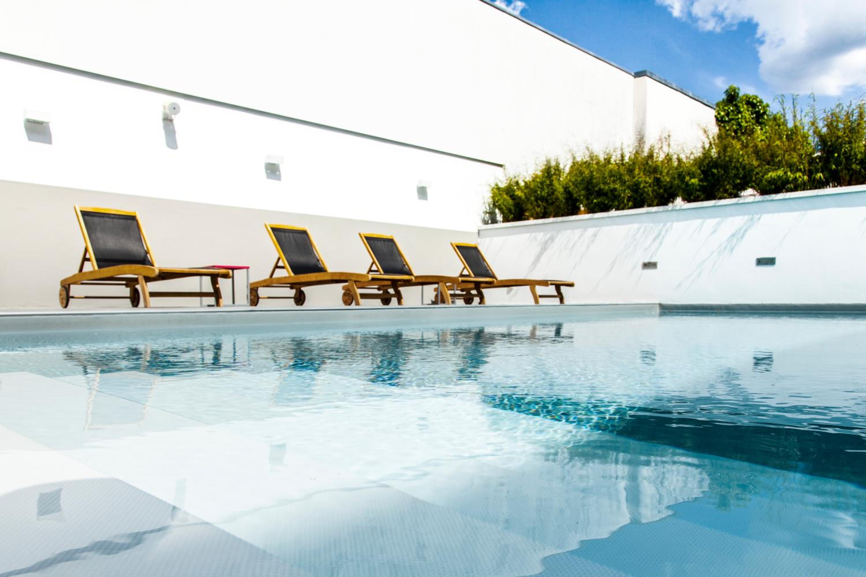 Standard room with double bed and  sofa