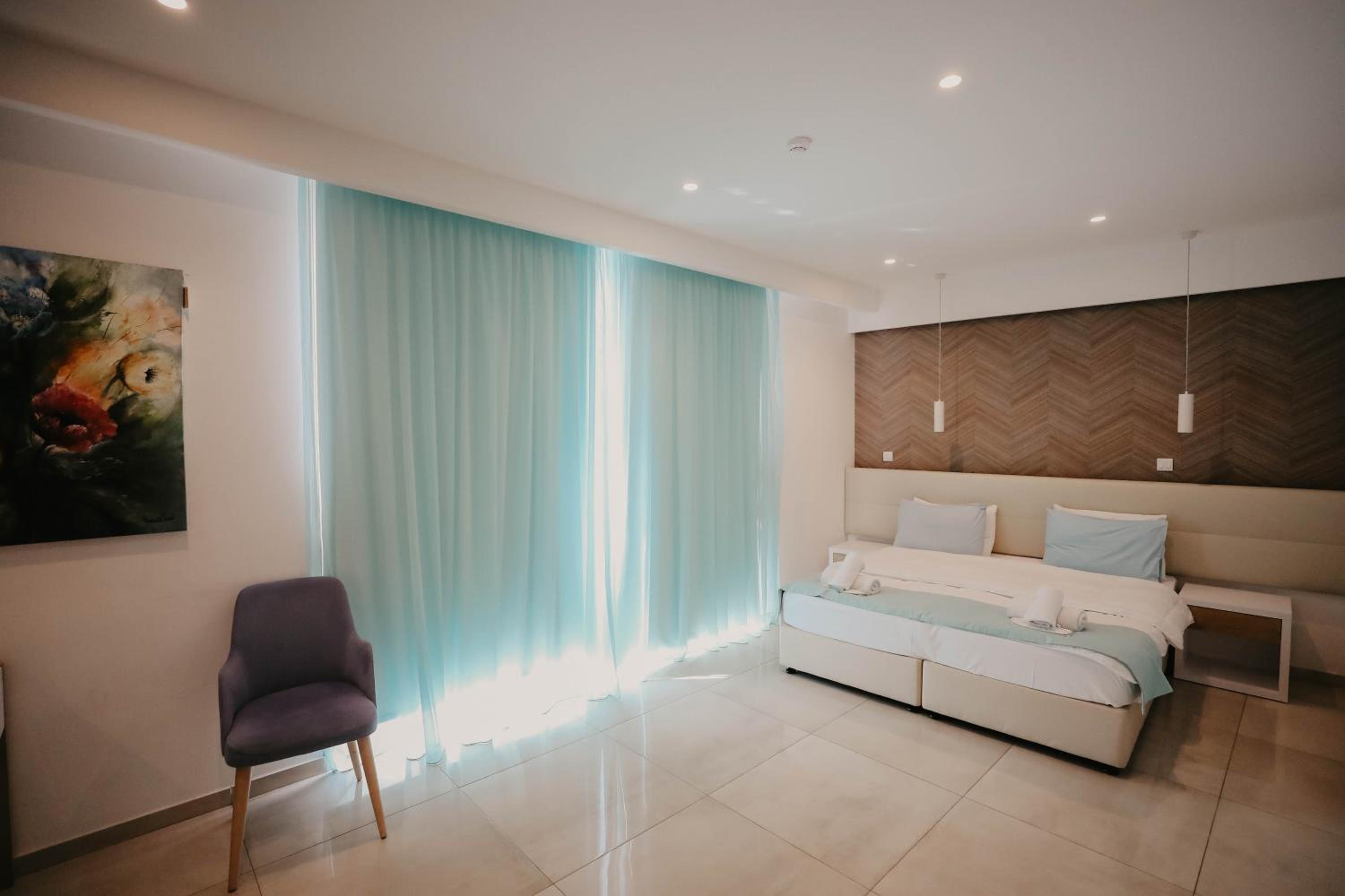 Triple Room with Side Sea View Balcony