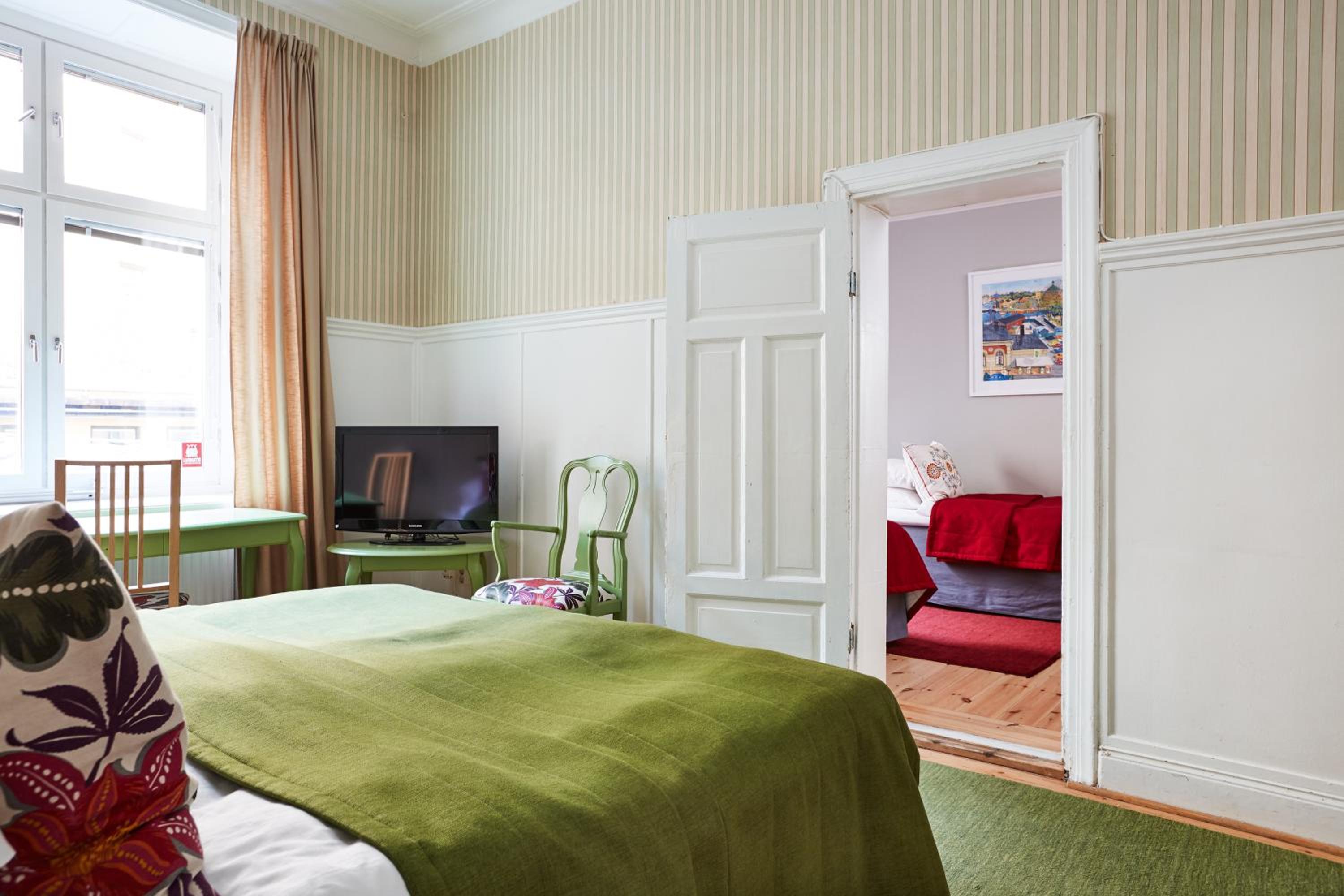 Quadruple Room with Private Bathroom