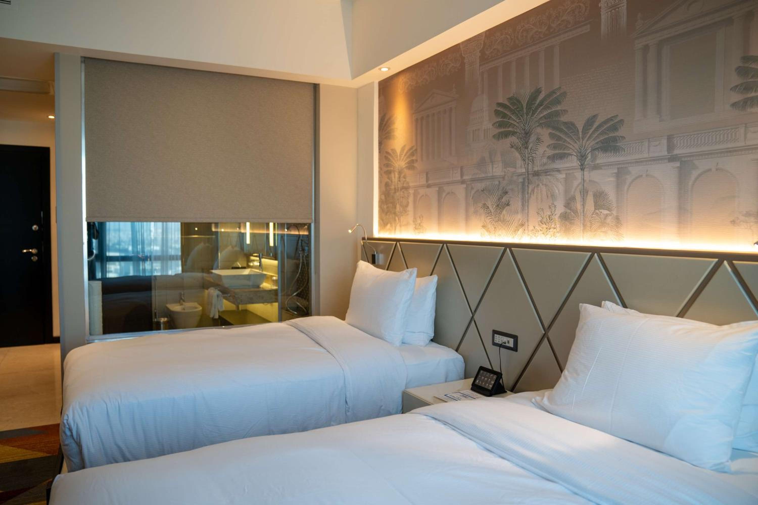 Two-Bedroom Suite with One King and Two Twin Beds