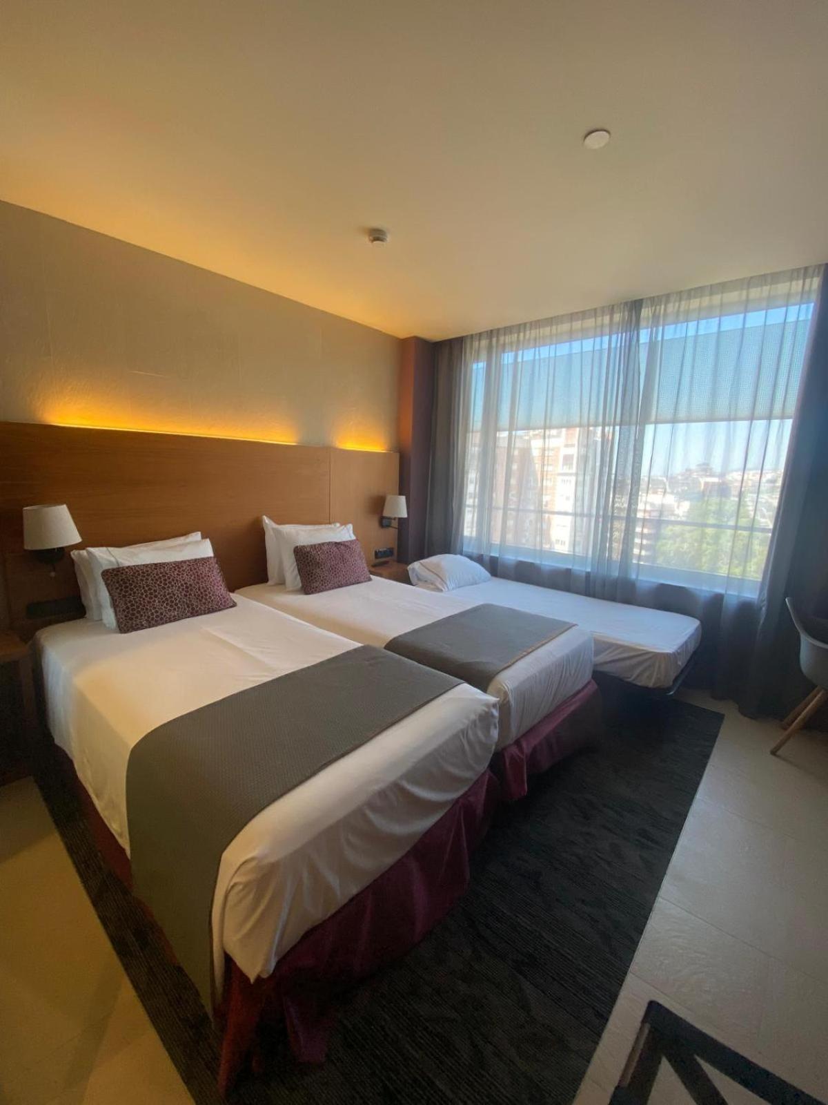 Double or Twin Room with Extra Bed (2 Adults + 1 Child)