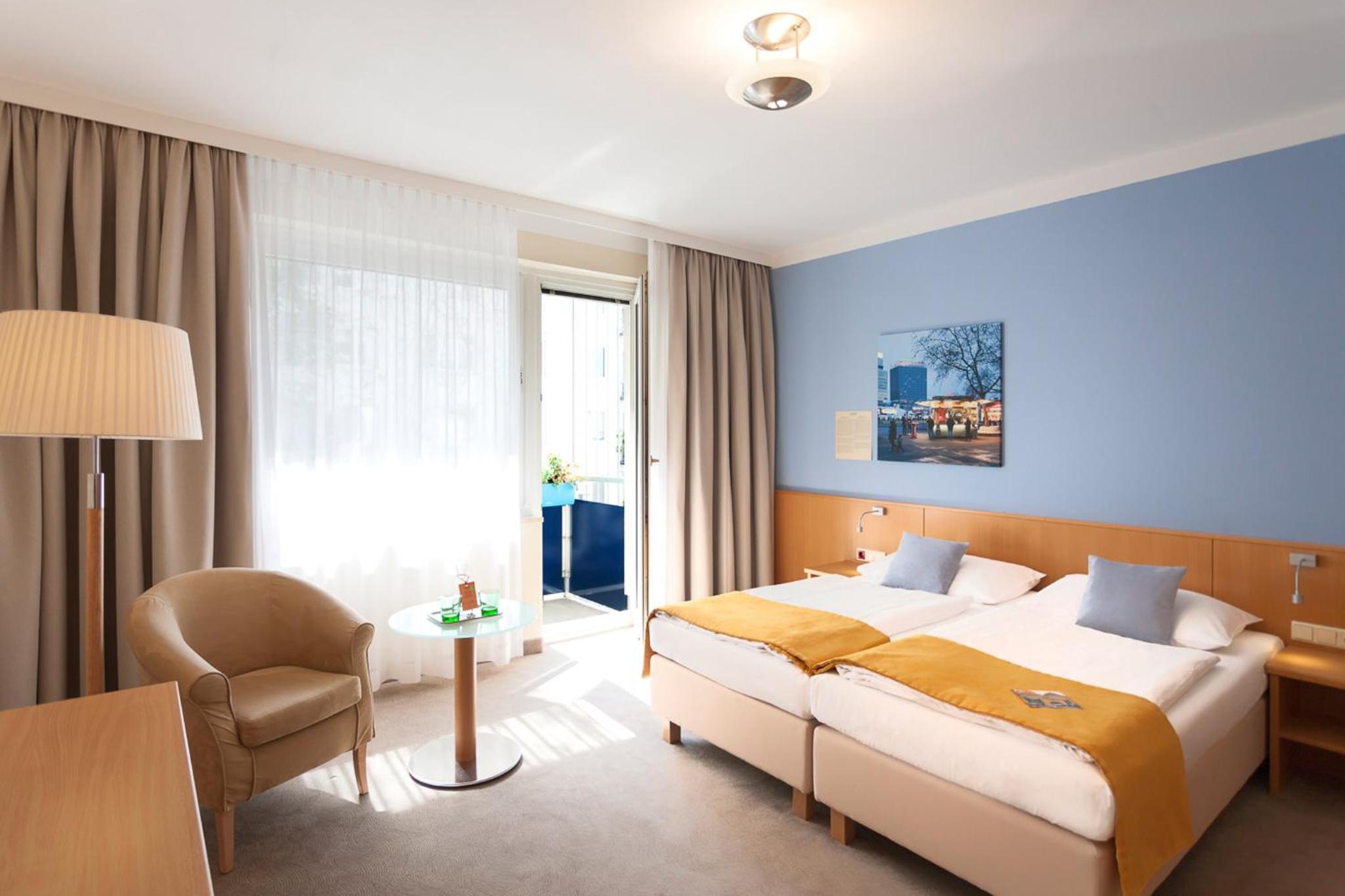 Deluxe Double Room with Balcony and Courtyard View