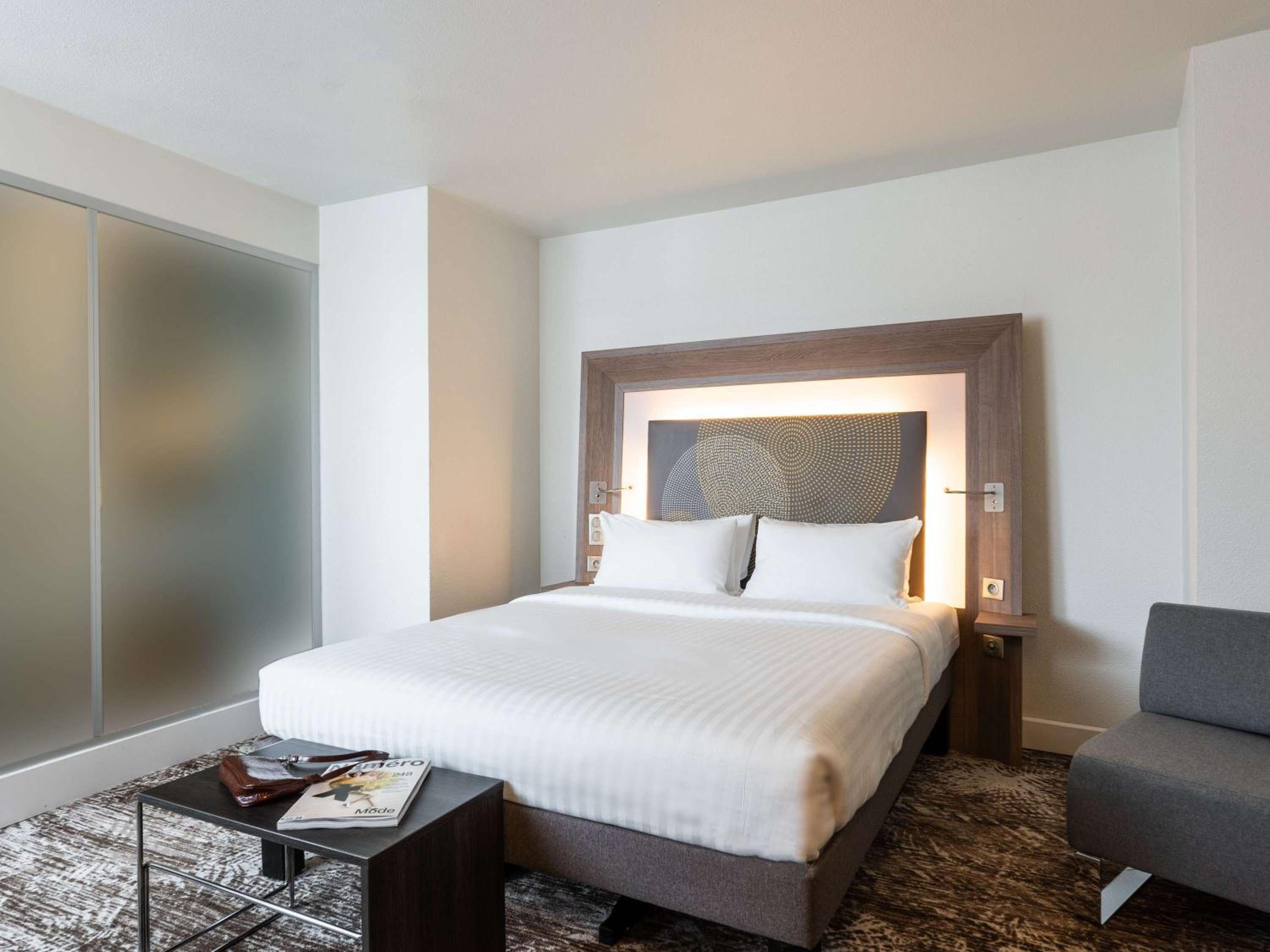 Executive Quadruple Room with Queen Bed and Double Sofa Bed