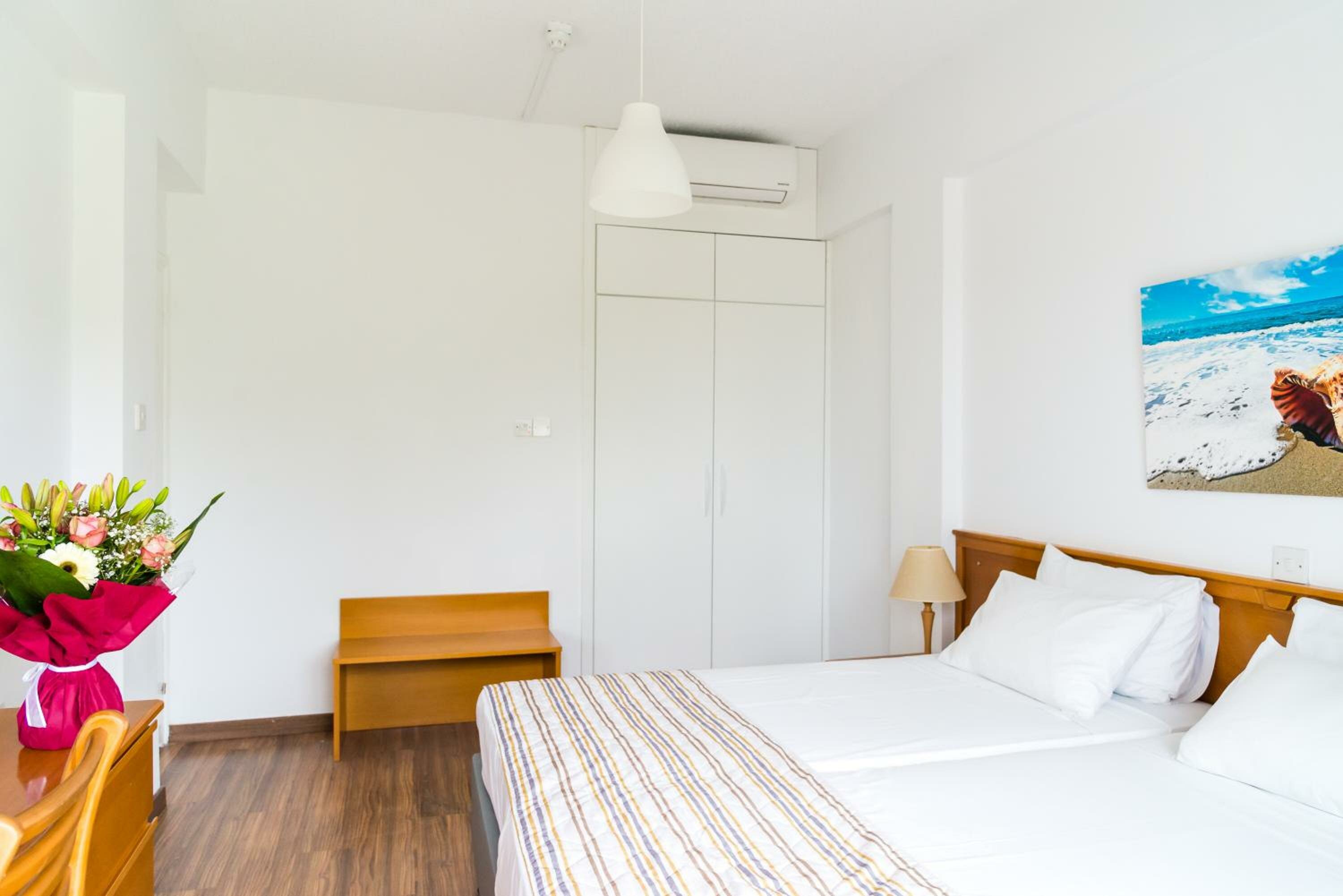 One-Bedroom Apartment with Side Sea View