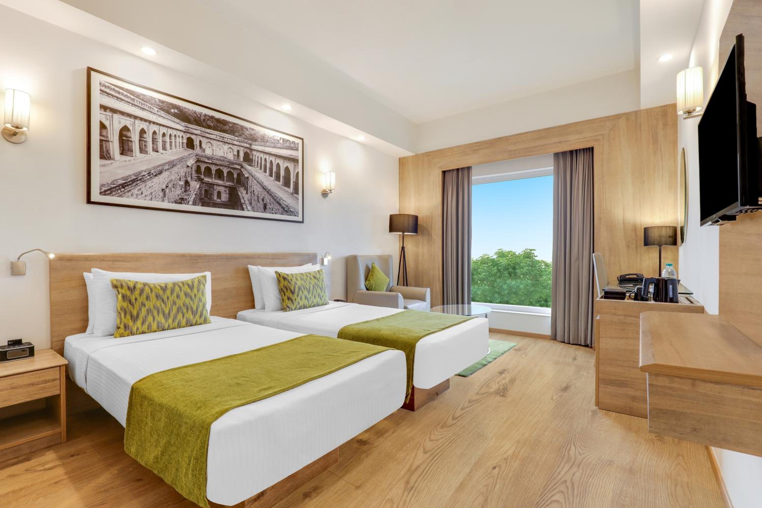 Premier Garden Room with Enjoy Happy Hours with 1+1 offer,15% Discount on F&B, Early Check In & Late Check out subject to availability, 02 pcs Laundry and complimentary 2 Pint of Beer