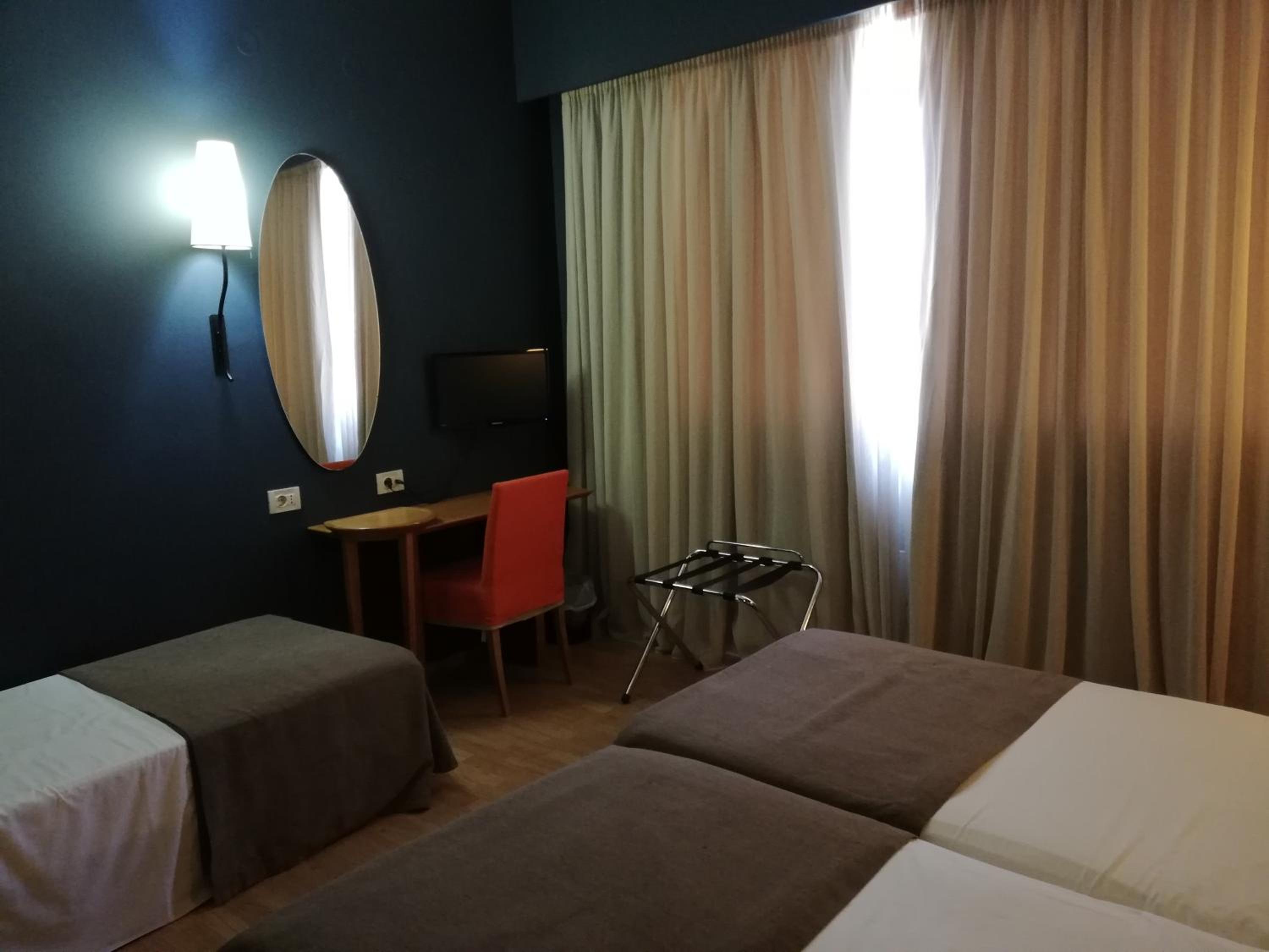 Triple Room (2 Adults + 1 Child)