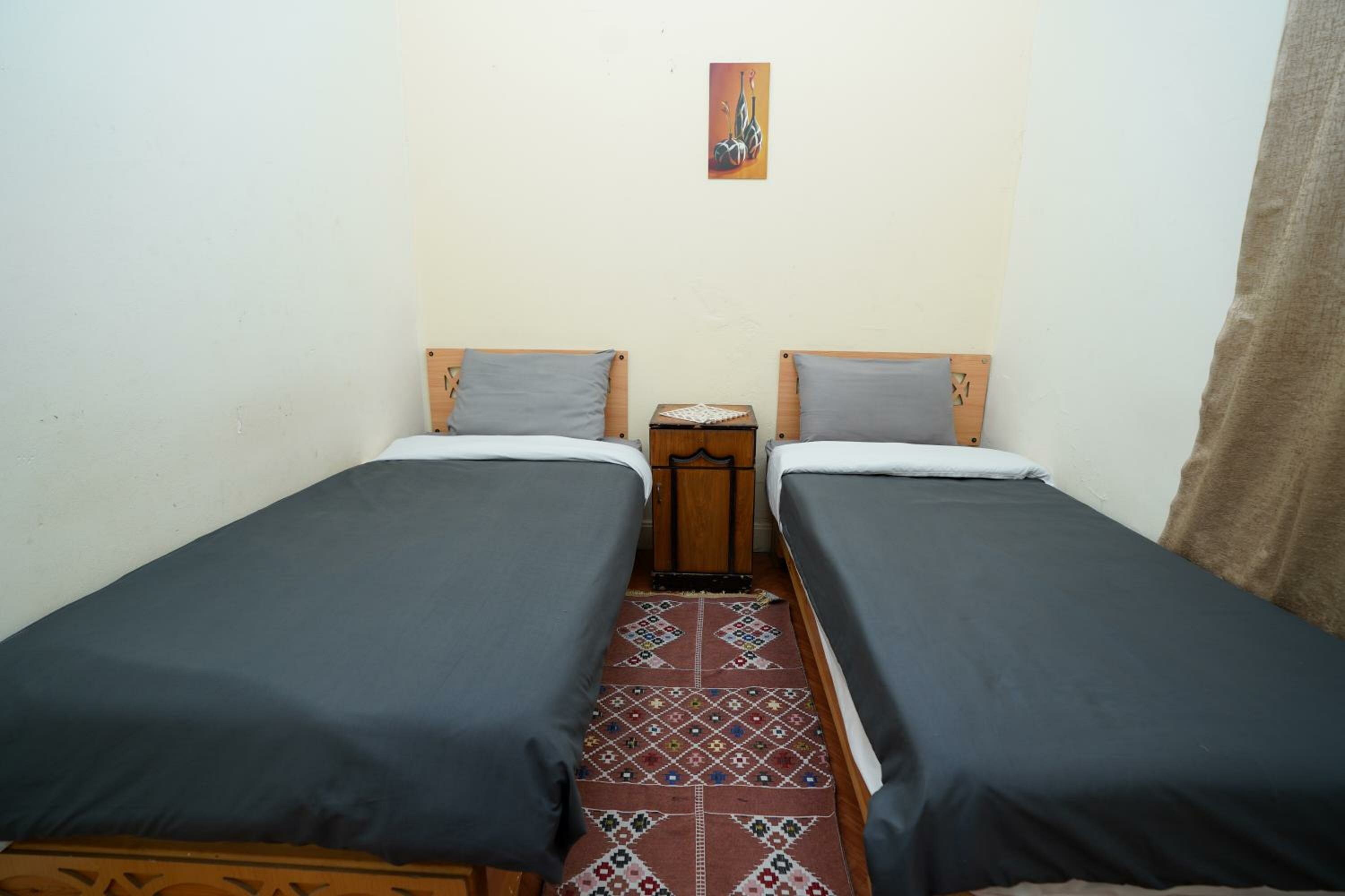 Single Room with Shared Bathroom and Fan