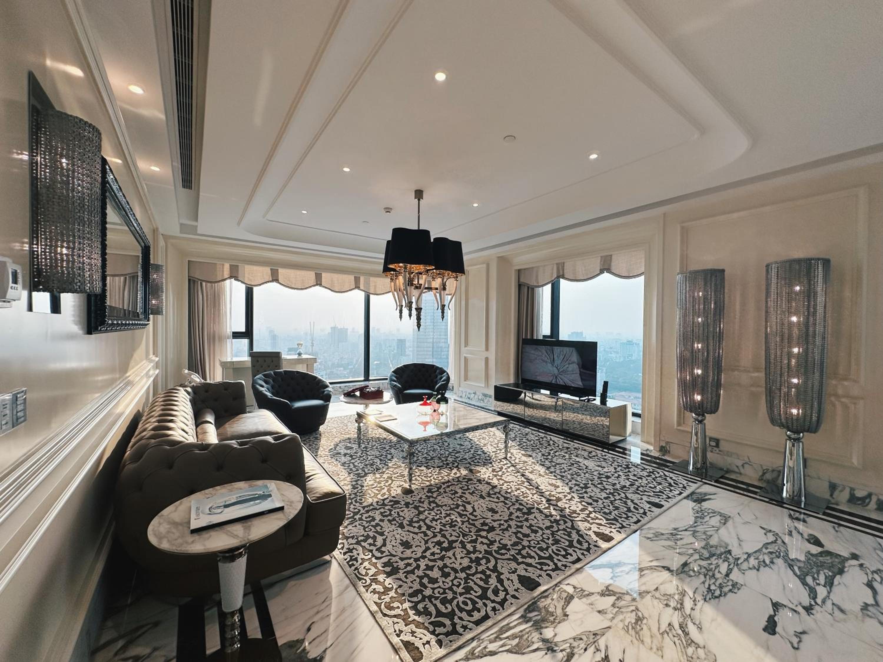 Designer Suite with Two-way Airport Transfer and Executive Lounge Access