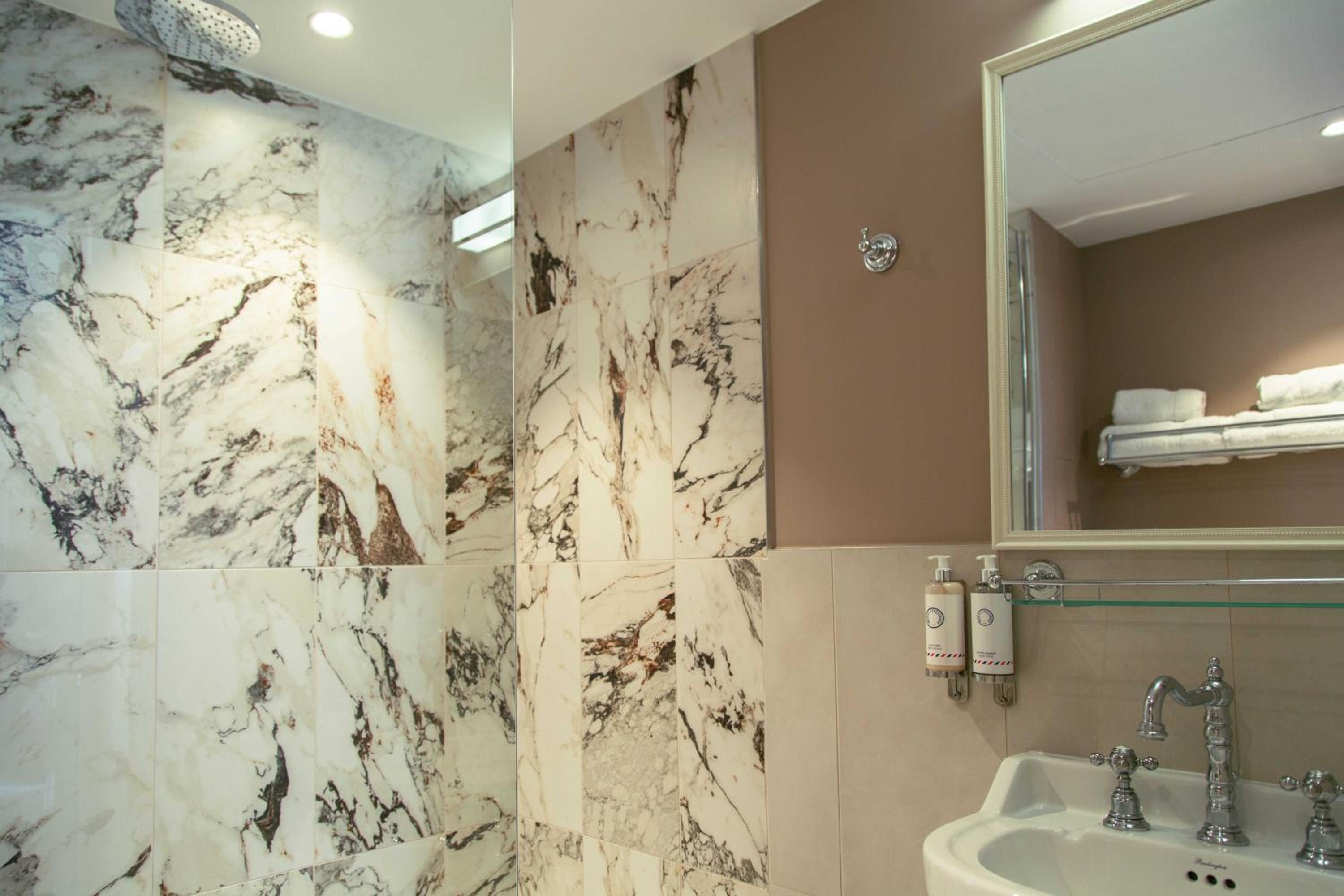 Renovated - Cocoon Room with Courtyard View 