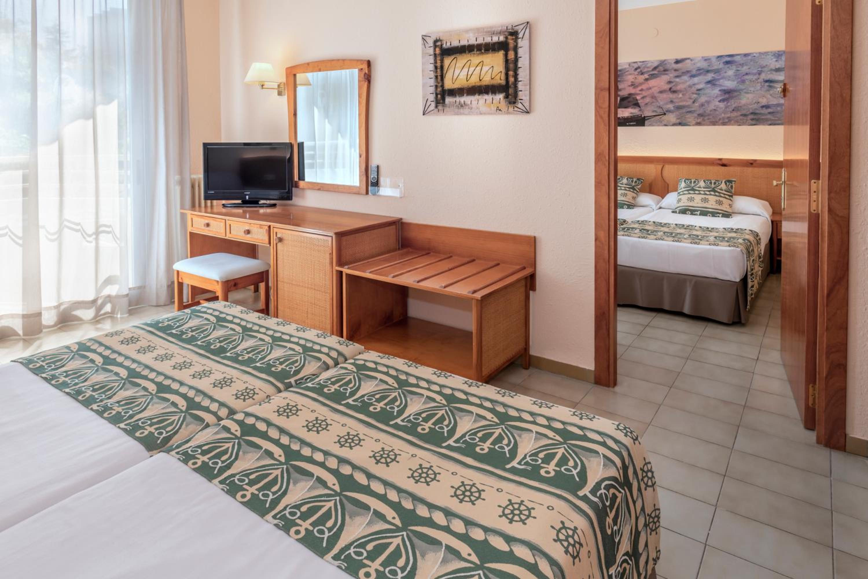 Double Room with Extra Bed and Balcony (2 Adults + 1 Child)