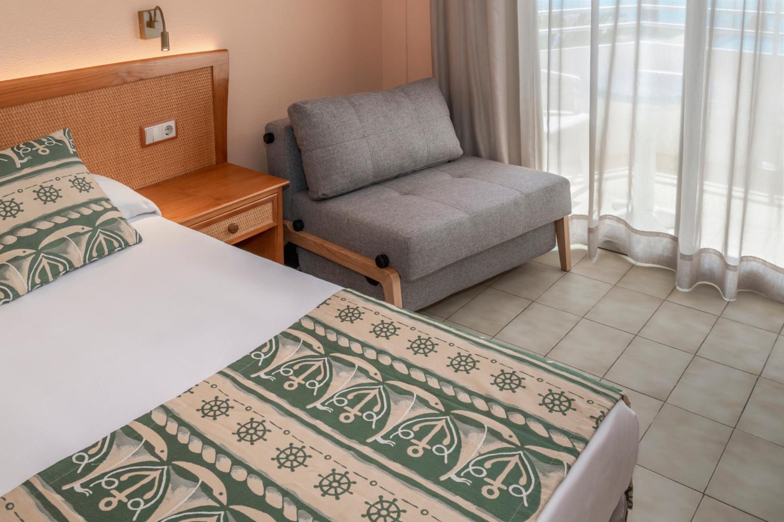 Double Room with Extra Bed and Balcony (2 Adults + 1 Child)