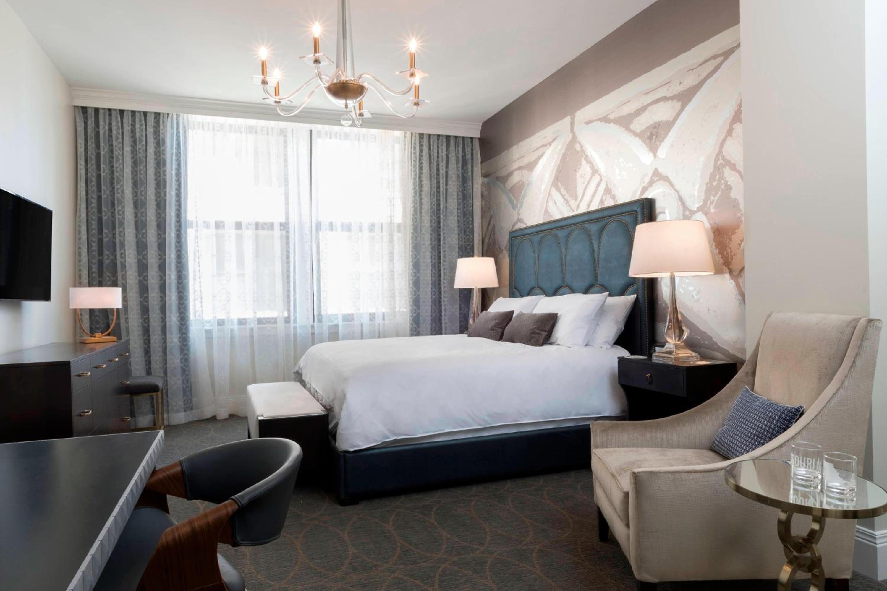 Guest room with King or Queen Beds and a sofa