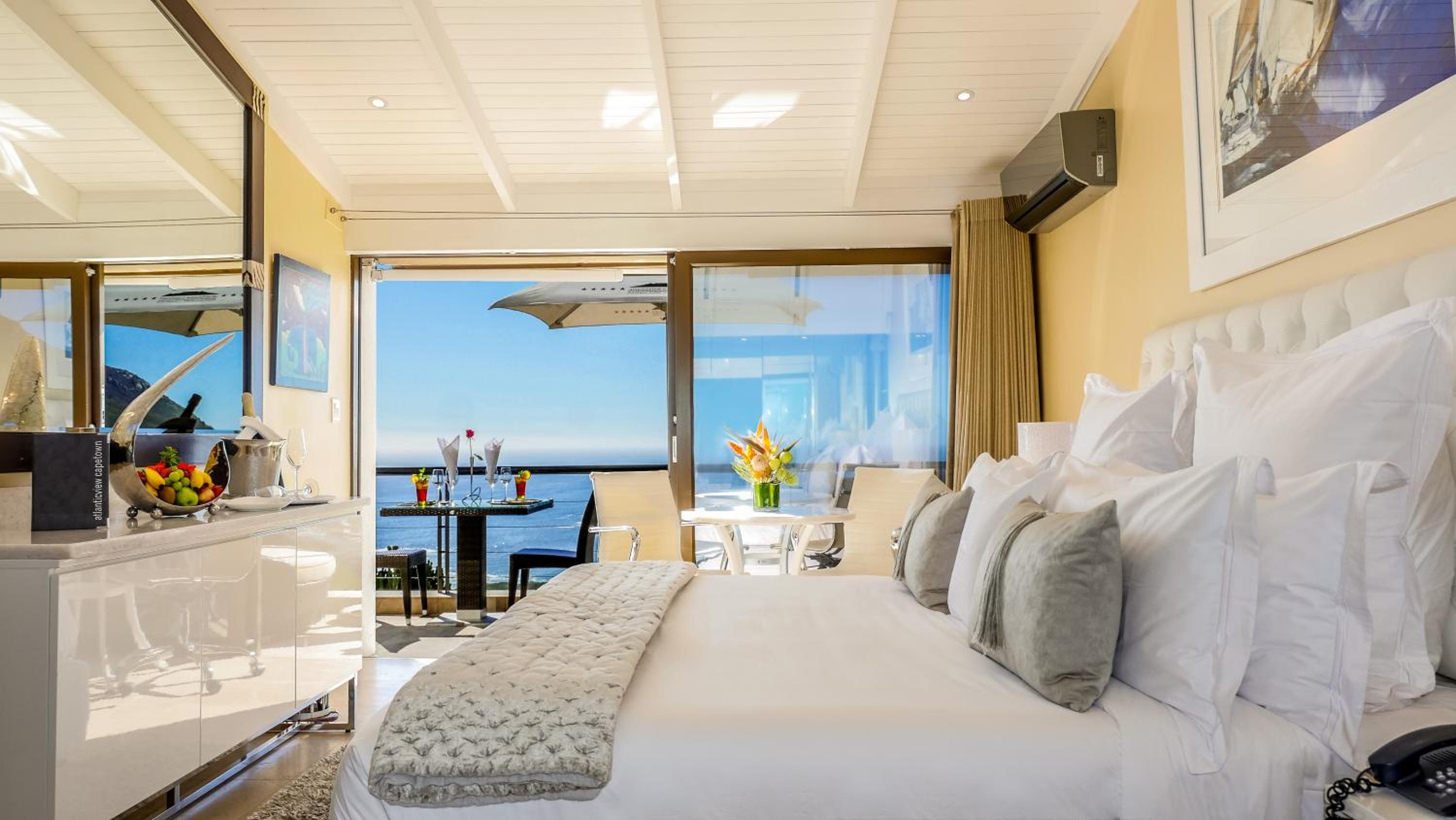 Deluxe Junior Suite with Terrace, Sea View and Mountain View (Master Bedroom)