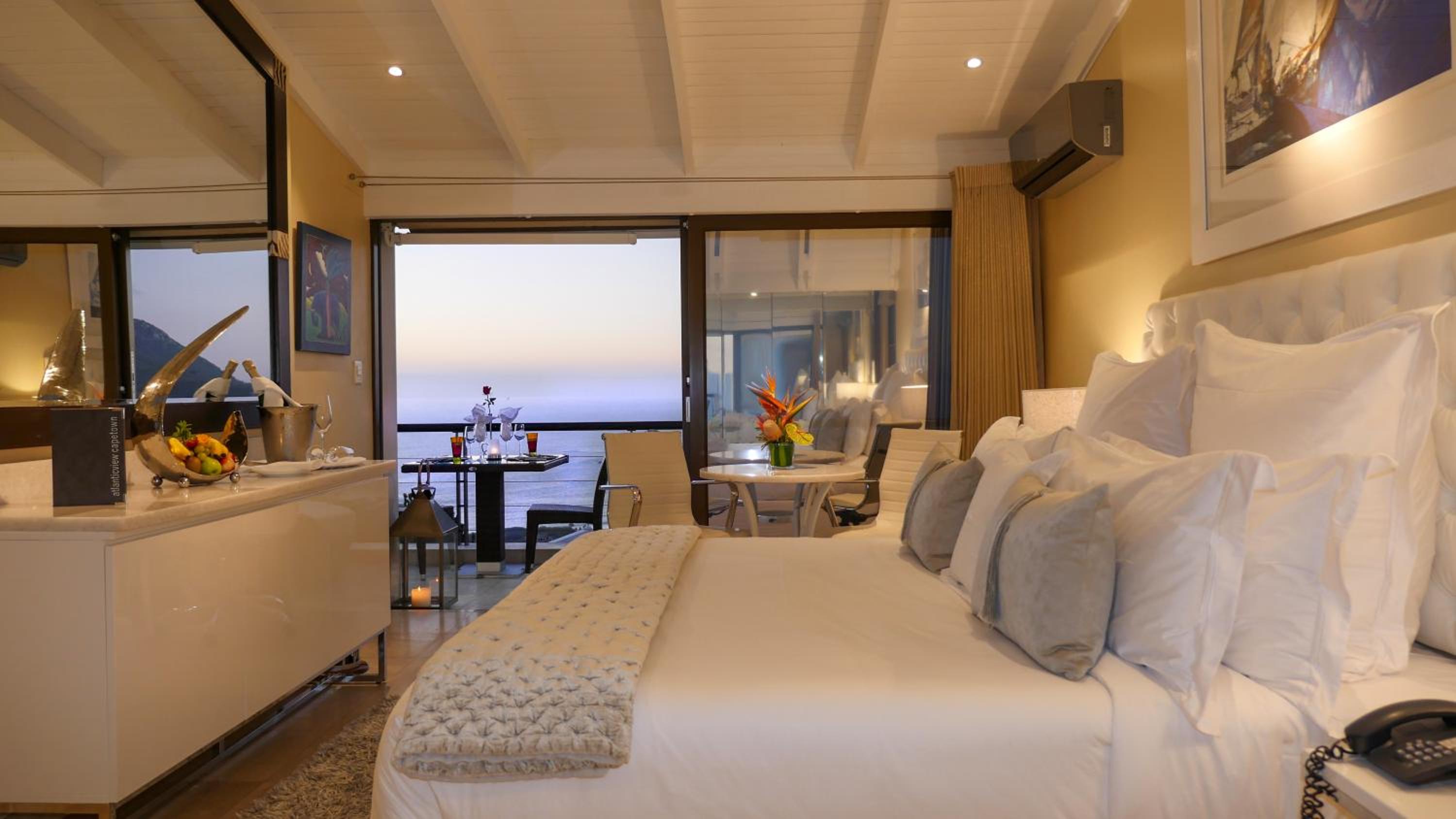 Deluxe Junior Suite with Terrace, Sea View and Mountain View (Master Bedroom)