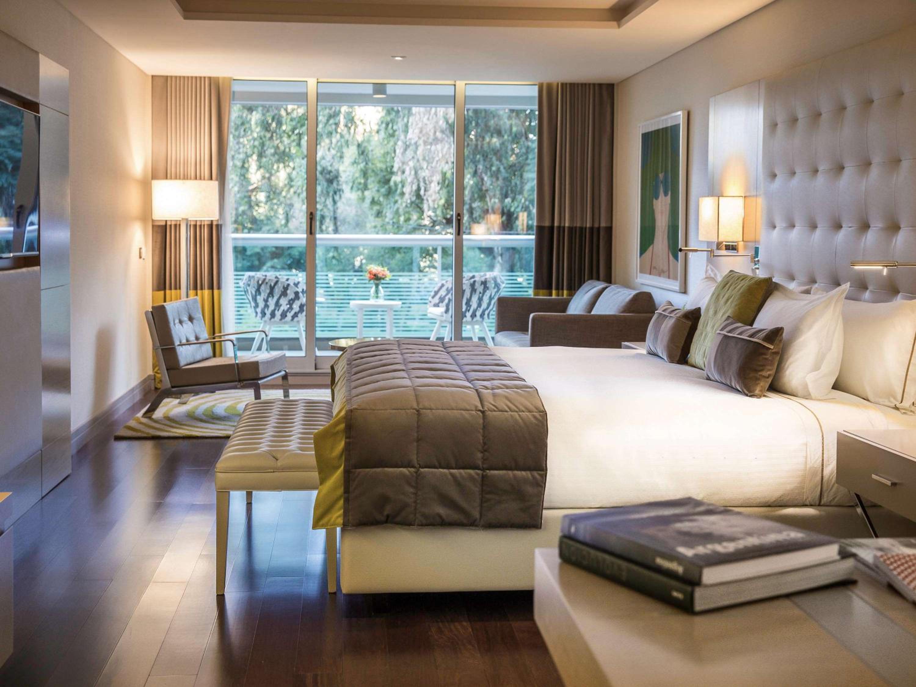 Deluxe King Suite with Balcony and Park View