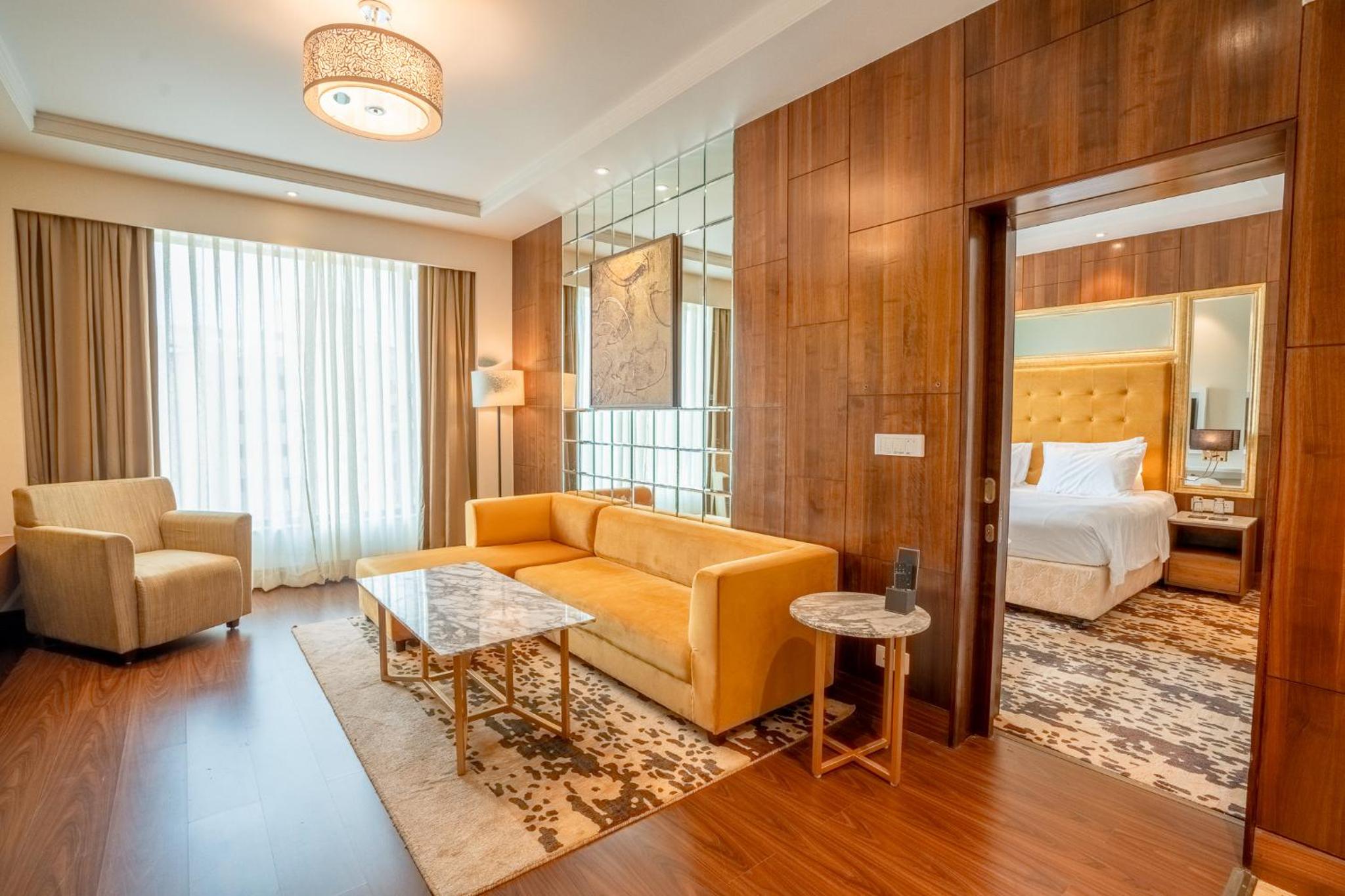 One-Bedroom Suite with Complimentary 4 pcs for Ironing per stay , 20% discount on food and soft beverage and access to business lounge