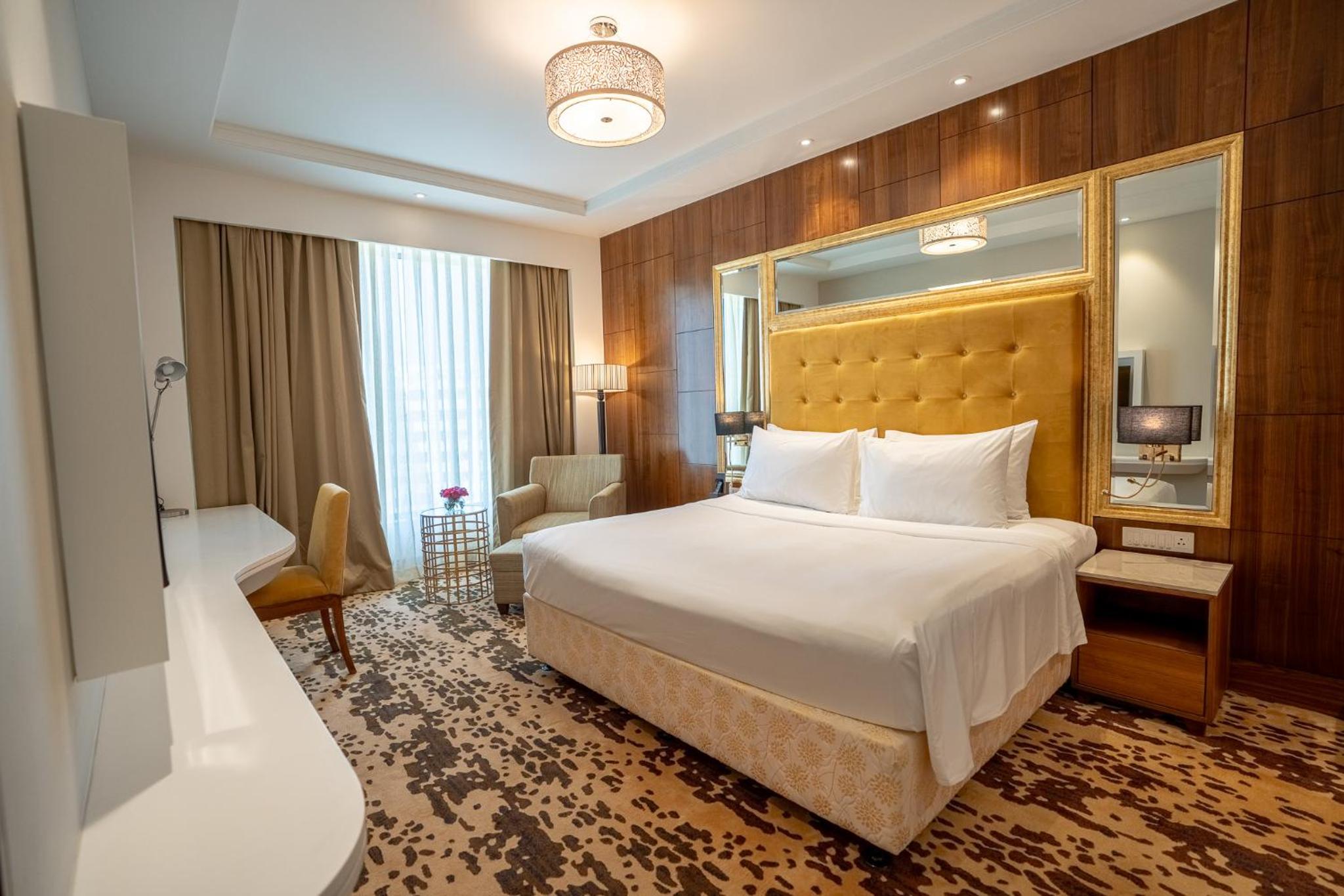 One-Bedroom Suite with Complimentary 4 pcs for Ironing per stay , 20% discount on food and soft beverage and access to business lounge