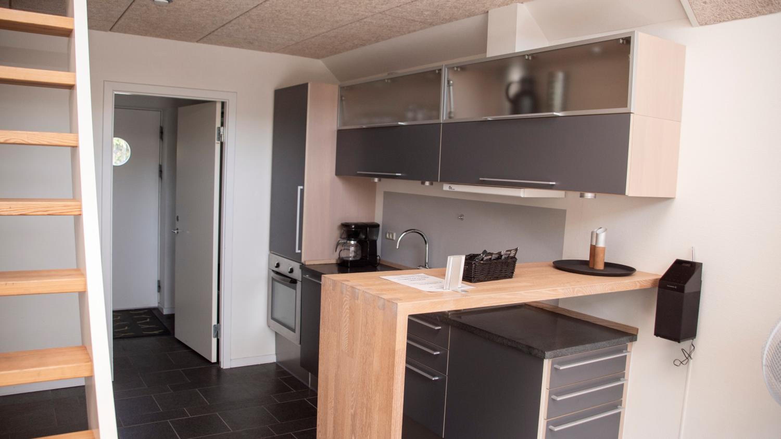  Lejlighed med udsigt til gårdhaven, 1 sal. Med hems. Max 6 pers