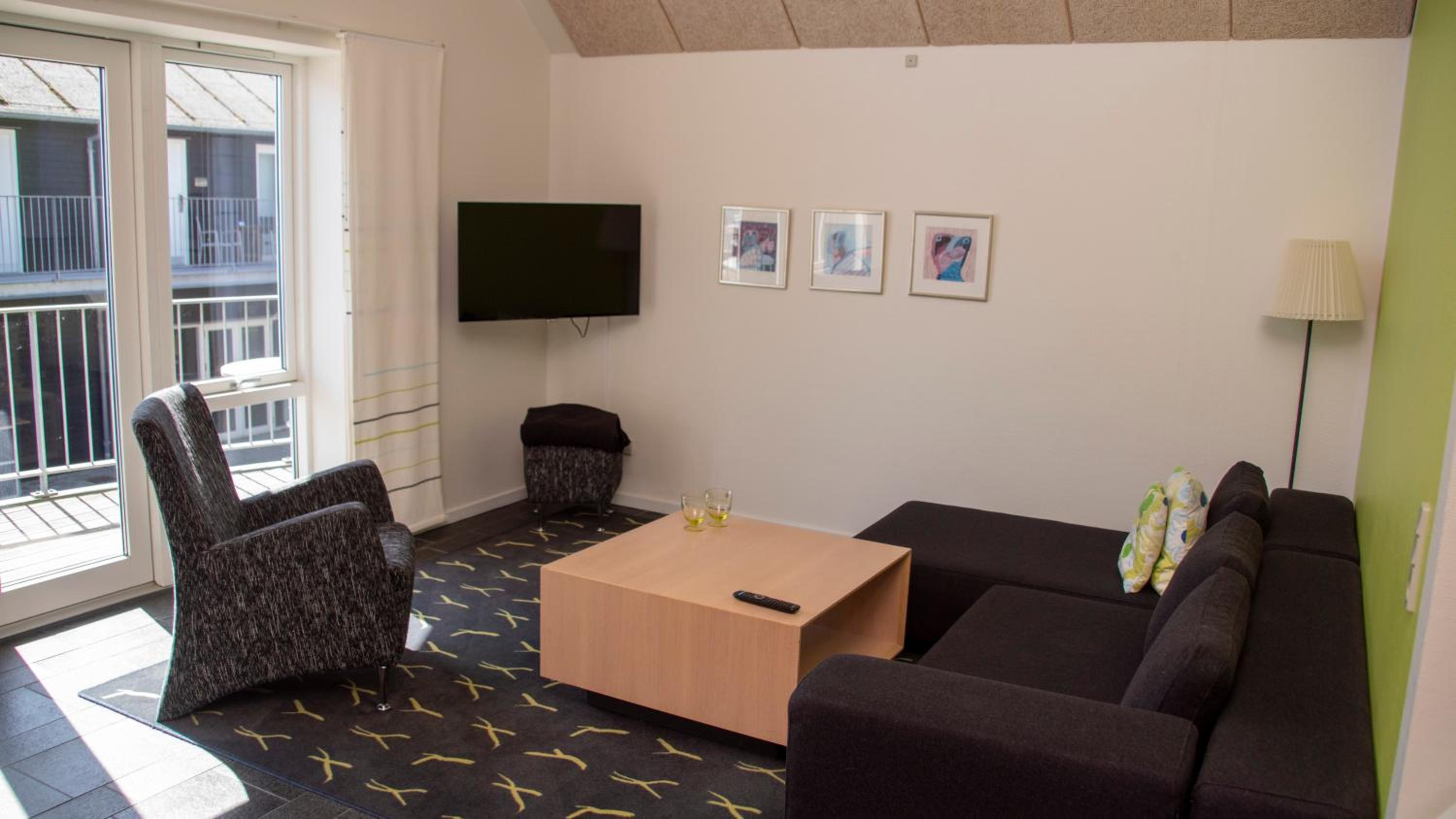  Lejlighed med udsigt til gårdhaven, 1 sal. Med hems. Max 6 pers