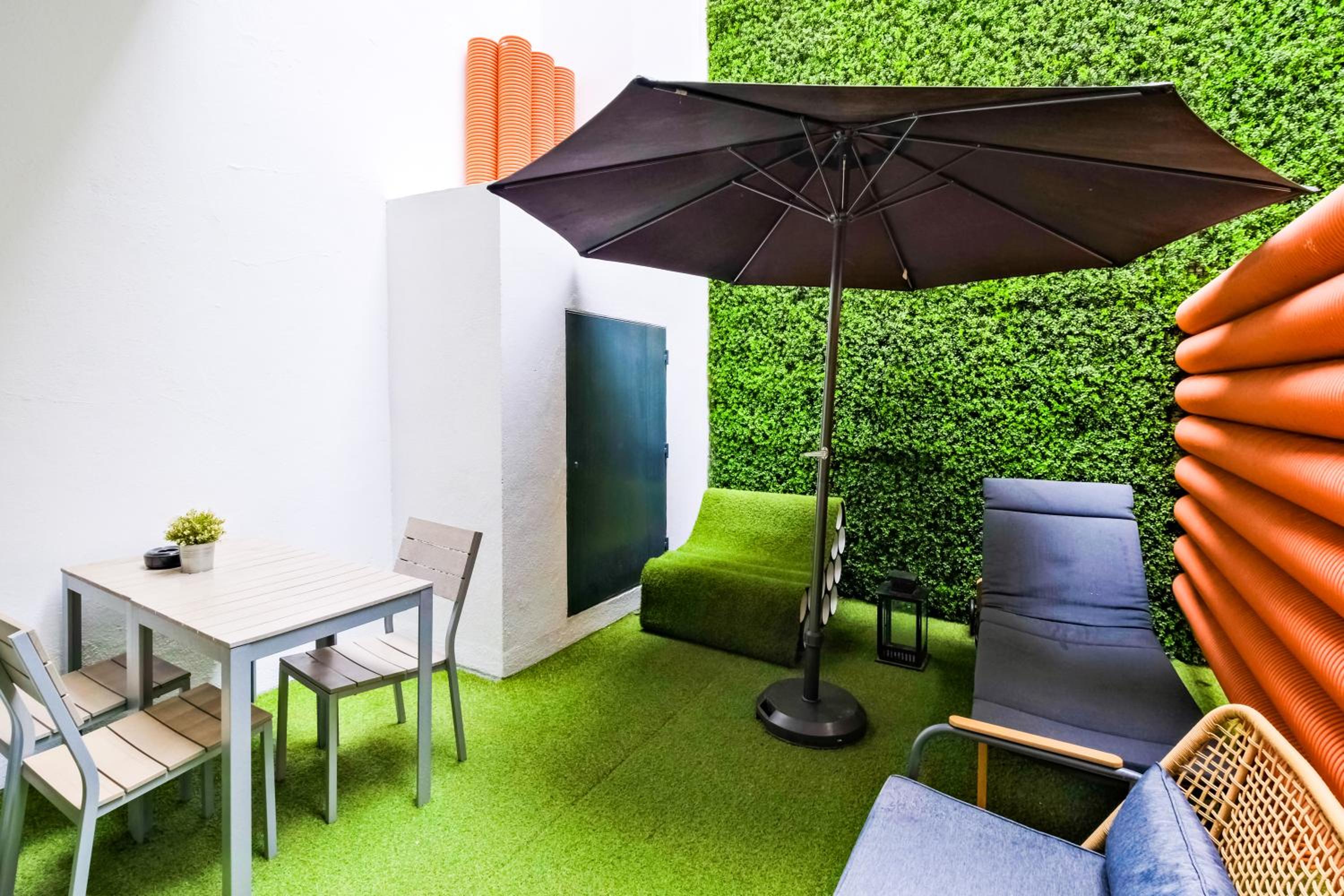 One-Bedroom Apartment with Terrace and City View