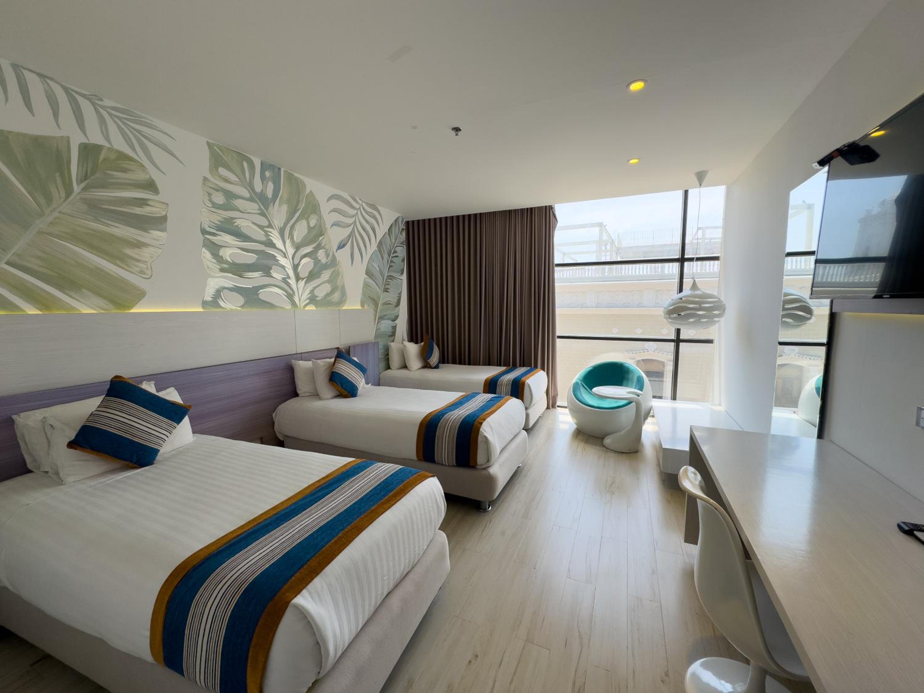 Deluxe Triple Room