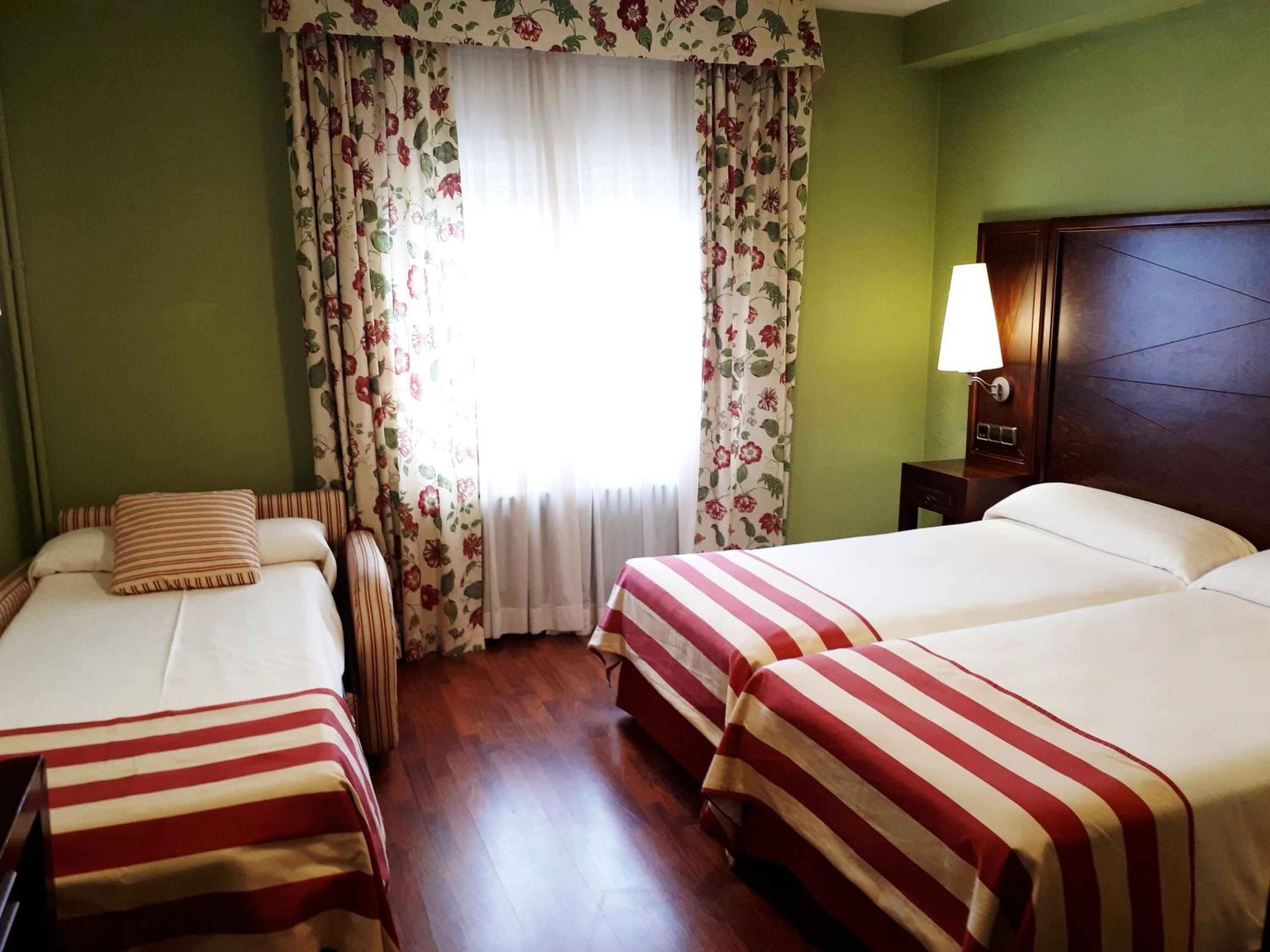 Double Room with Extra Bed (2 Adults + 1 Child)