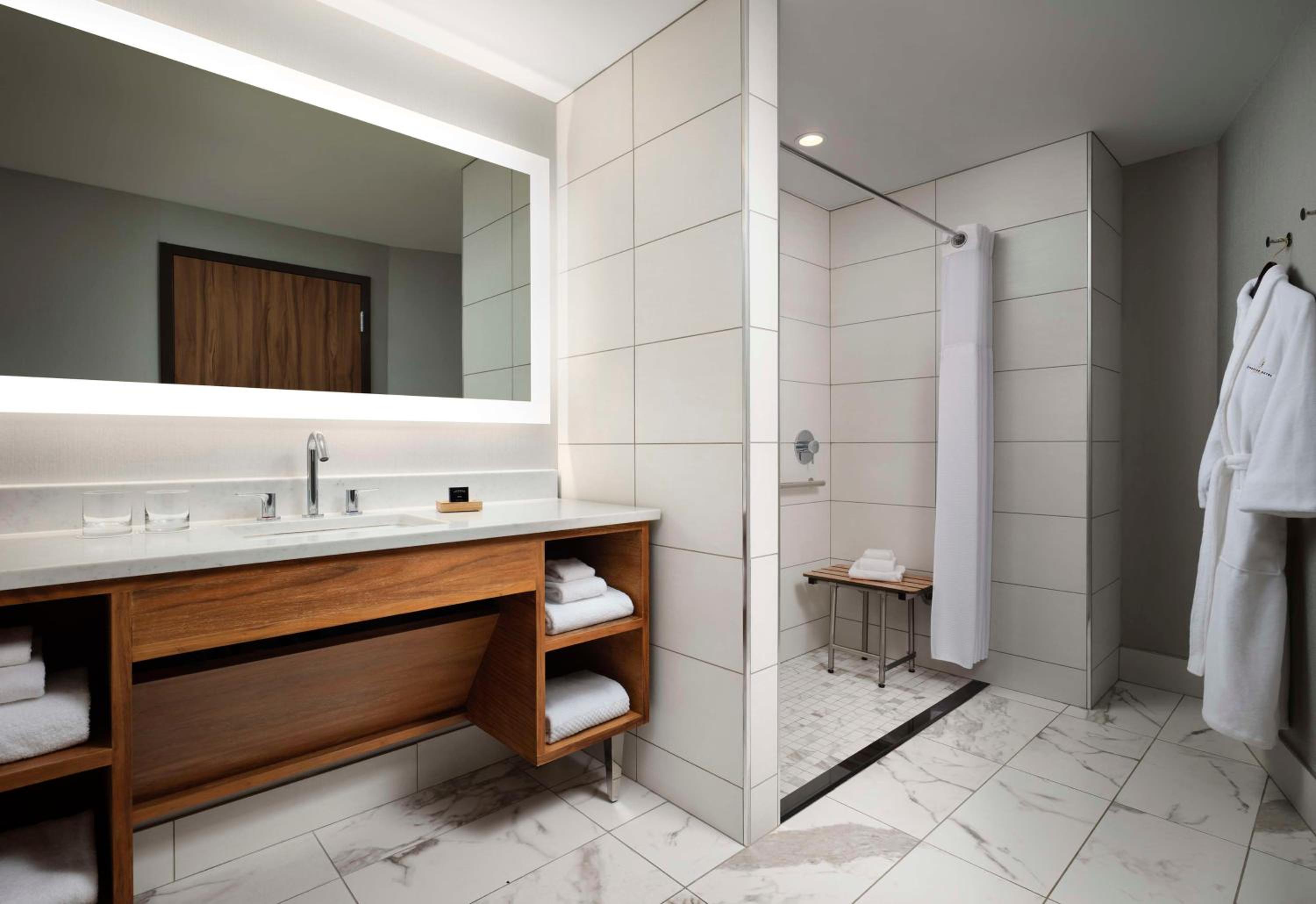 Corner King Room with City View - Mobility Accessible with Roll-In Shower