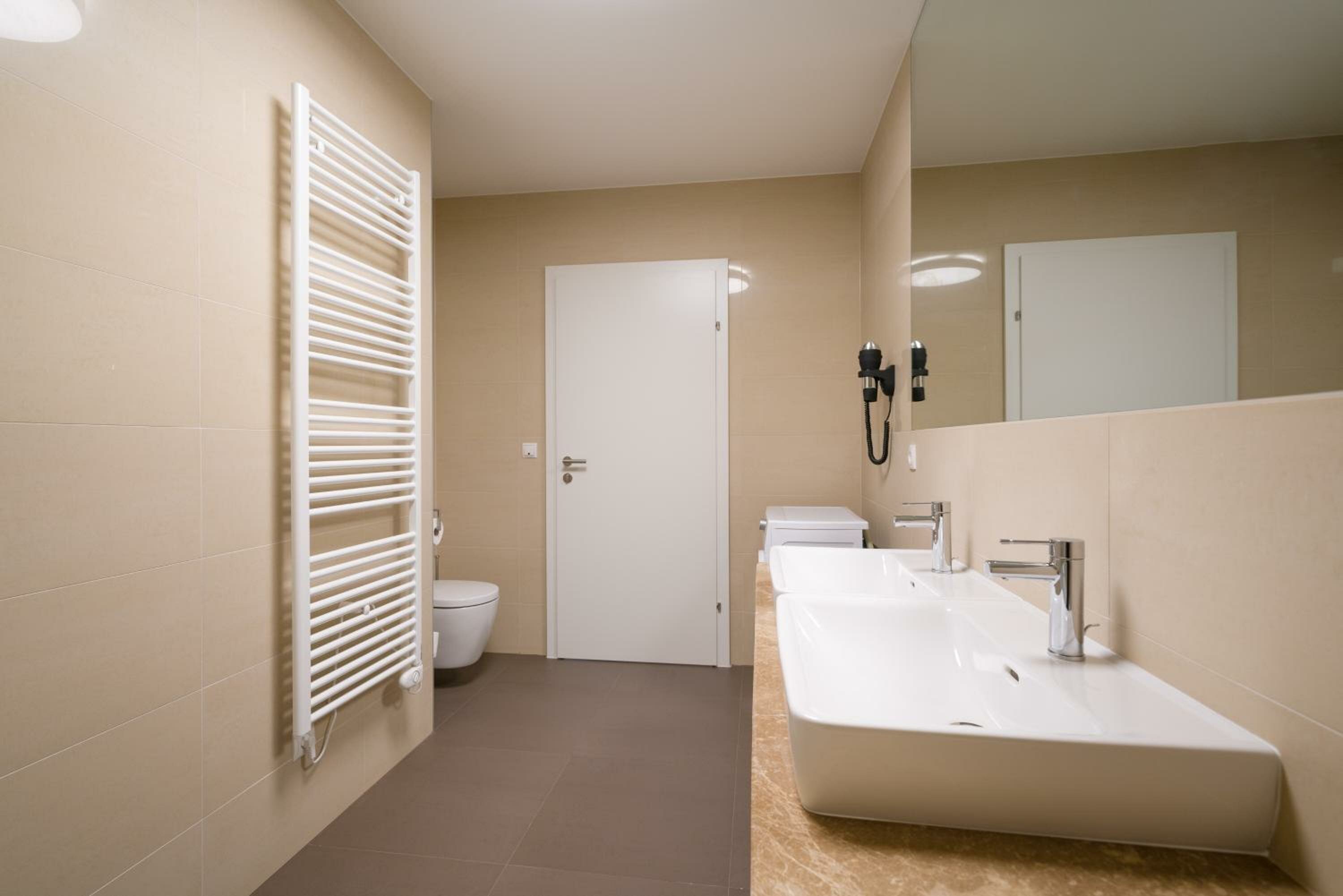 Four-Bedroom Apartment with Balcony 