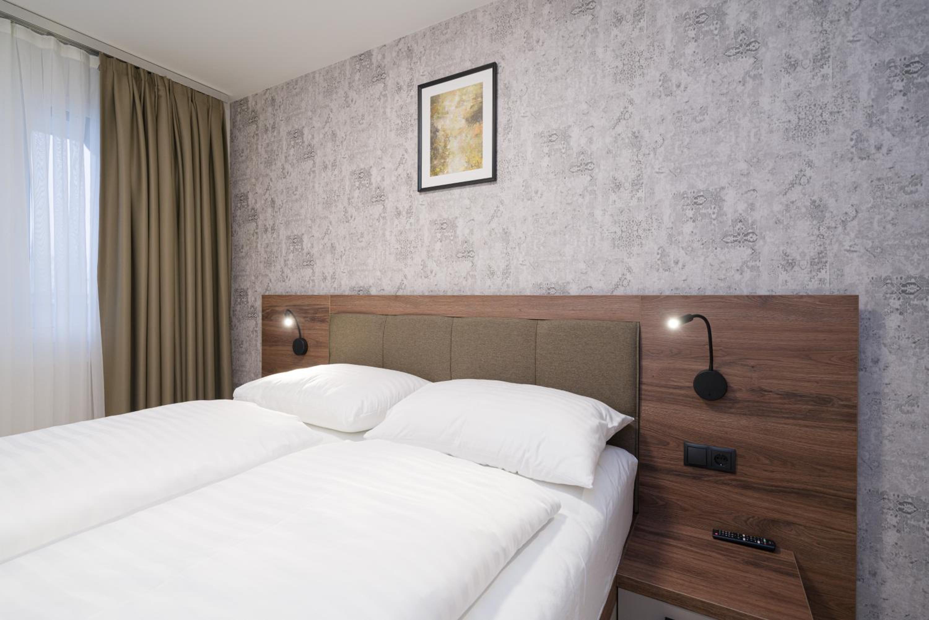 Four-Bedroom Apartment with Balcony 