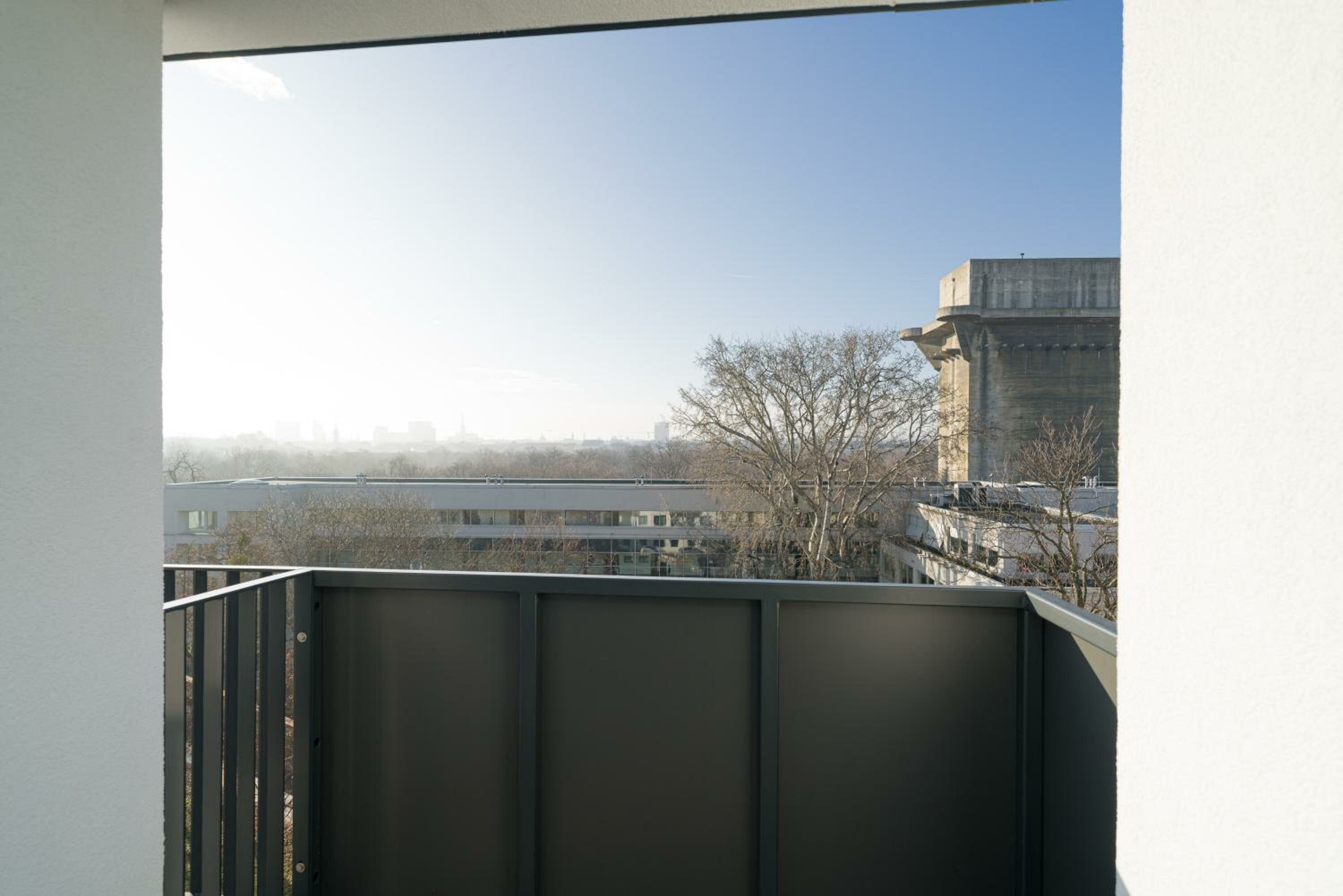 Four-Bedroom Apartment with Balcony 