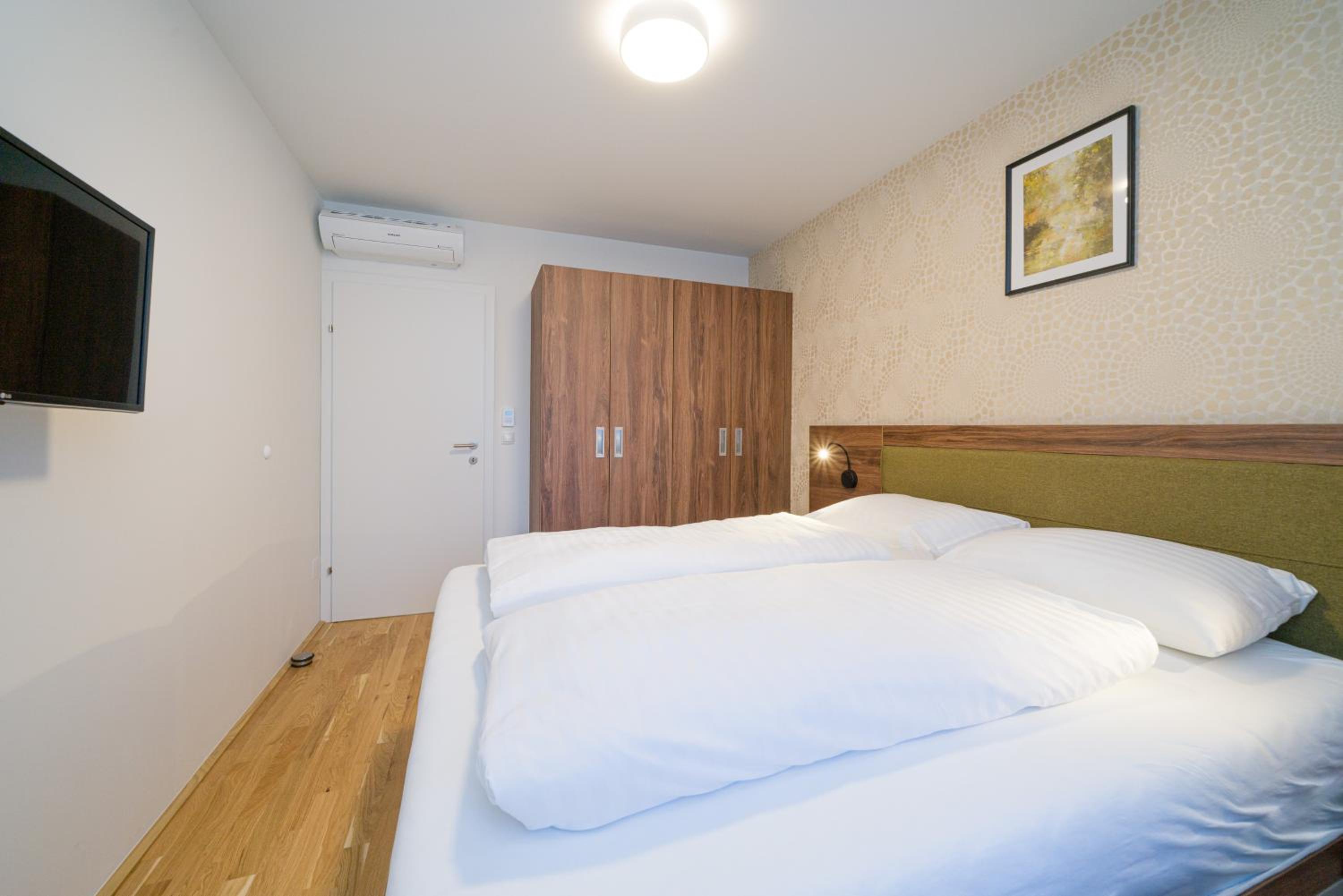 Four-Bedroom Apartment with Balcony 