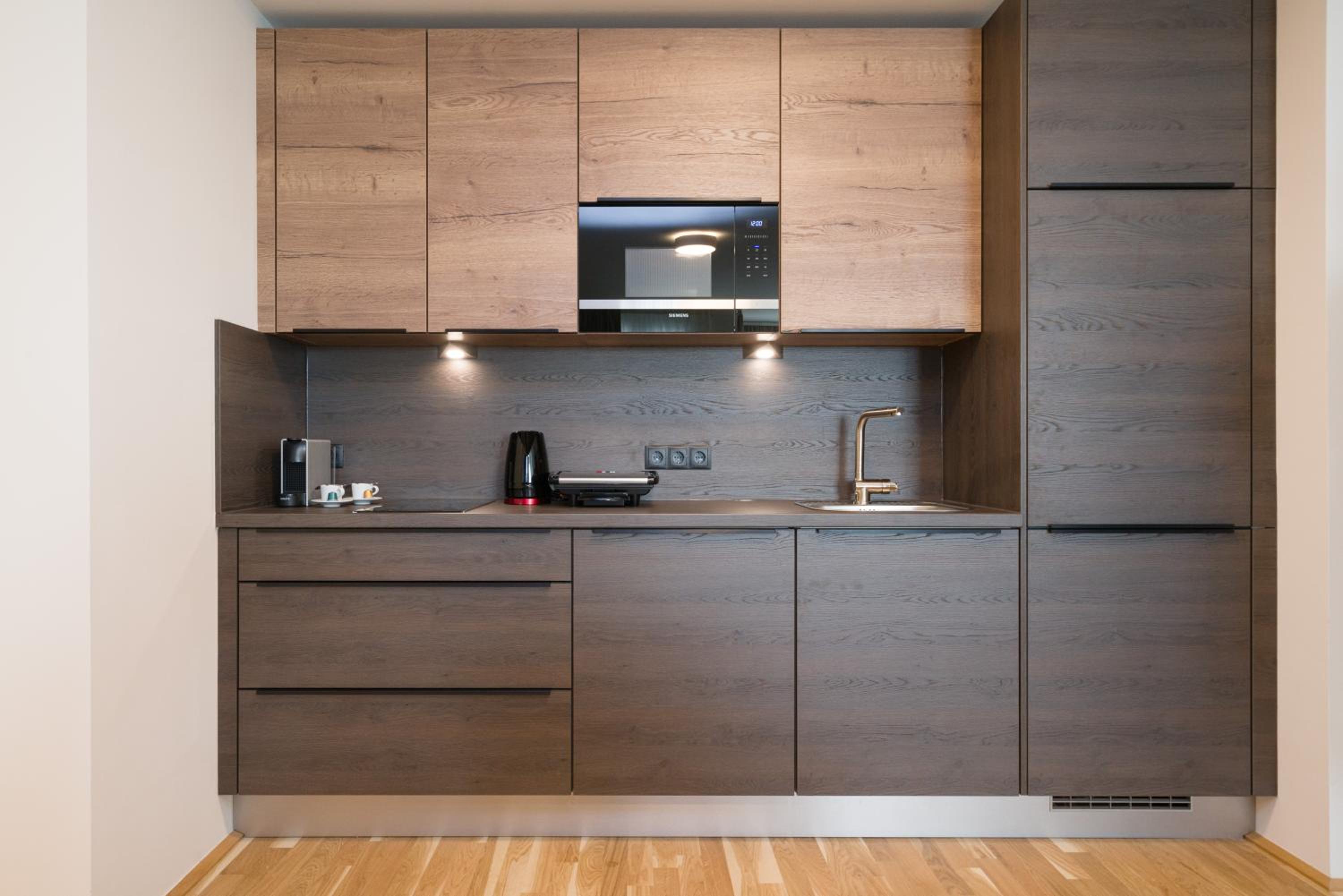 Four-Bedroom Apartment with Balcony 