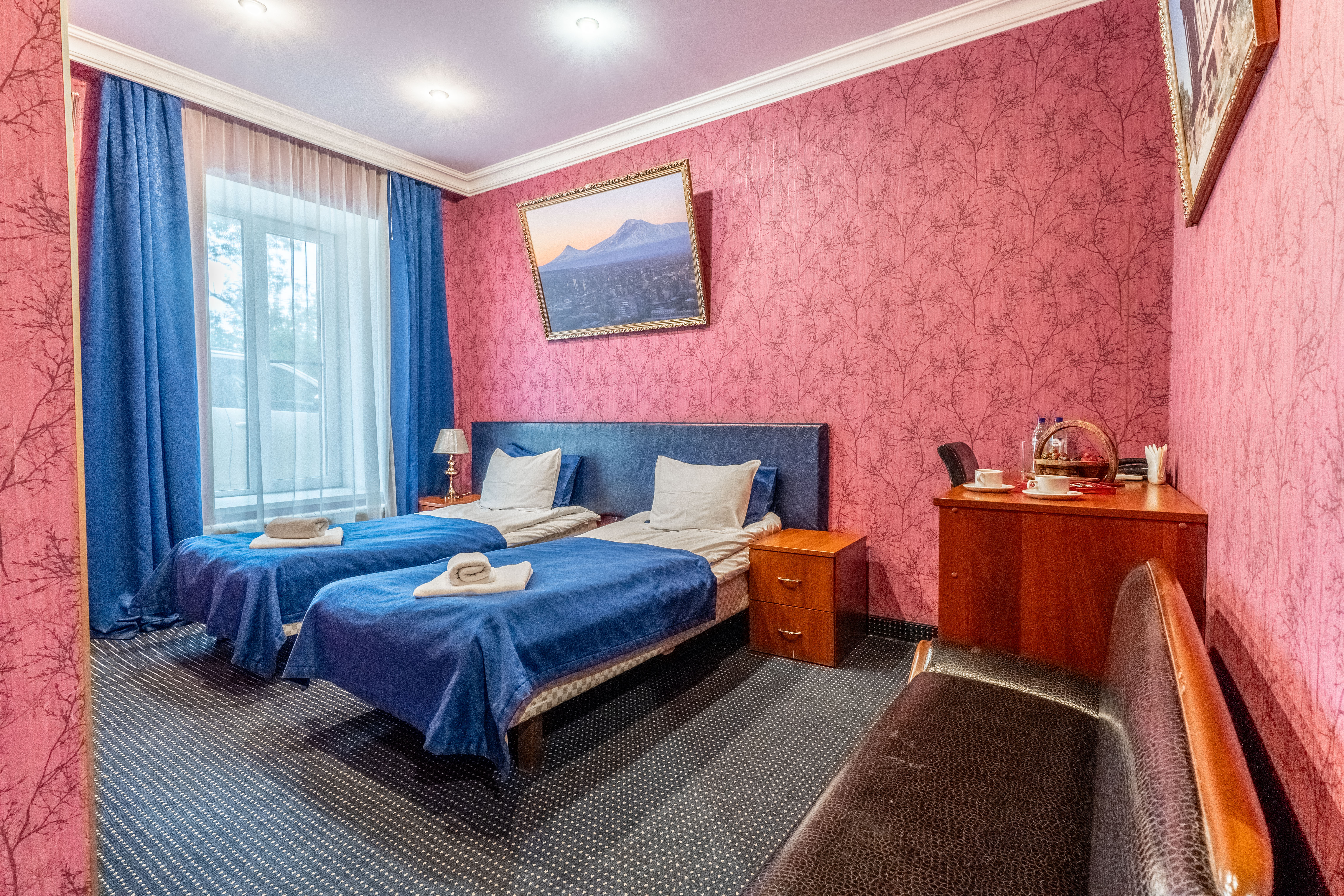 Улучшенный номер с кроватью размера «king-size» или 2 отдельными кроватями