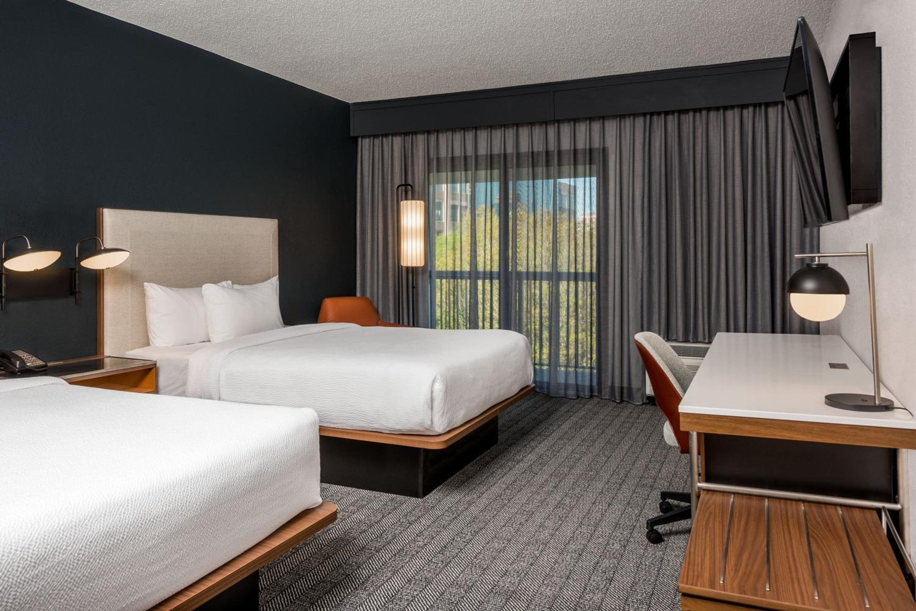 Guest Queen Room with Two Queen Beds and Balcony